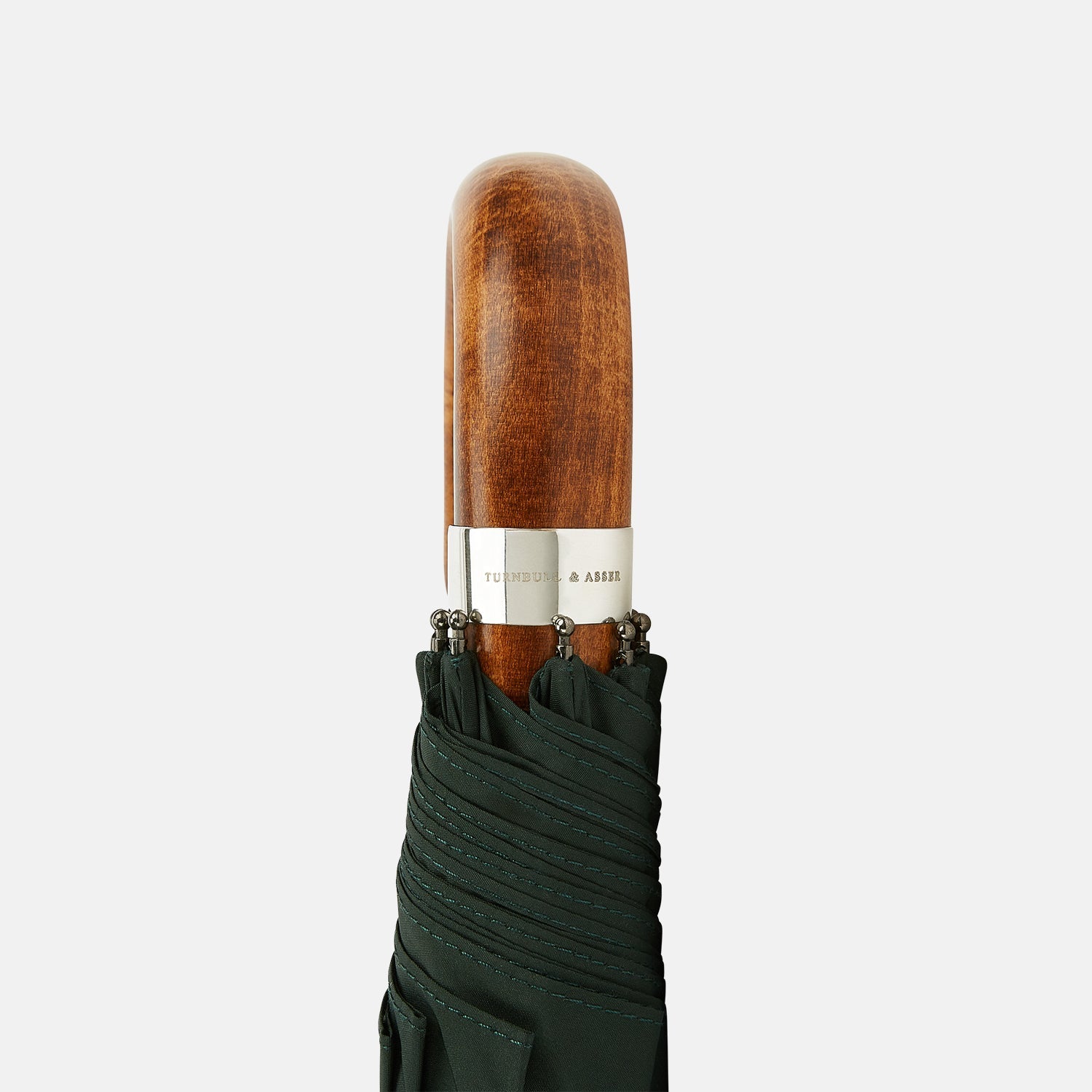 Image 3 of product The Turnbull & Asser Forest Green Telescopic Umbrella features a silver shaft and a brown maple crook handle, shown fully open against a plain white background.