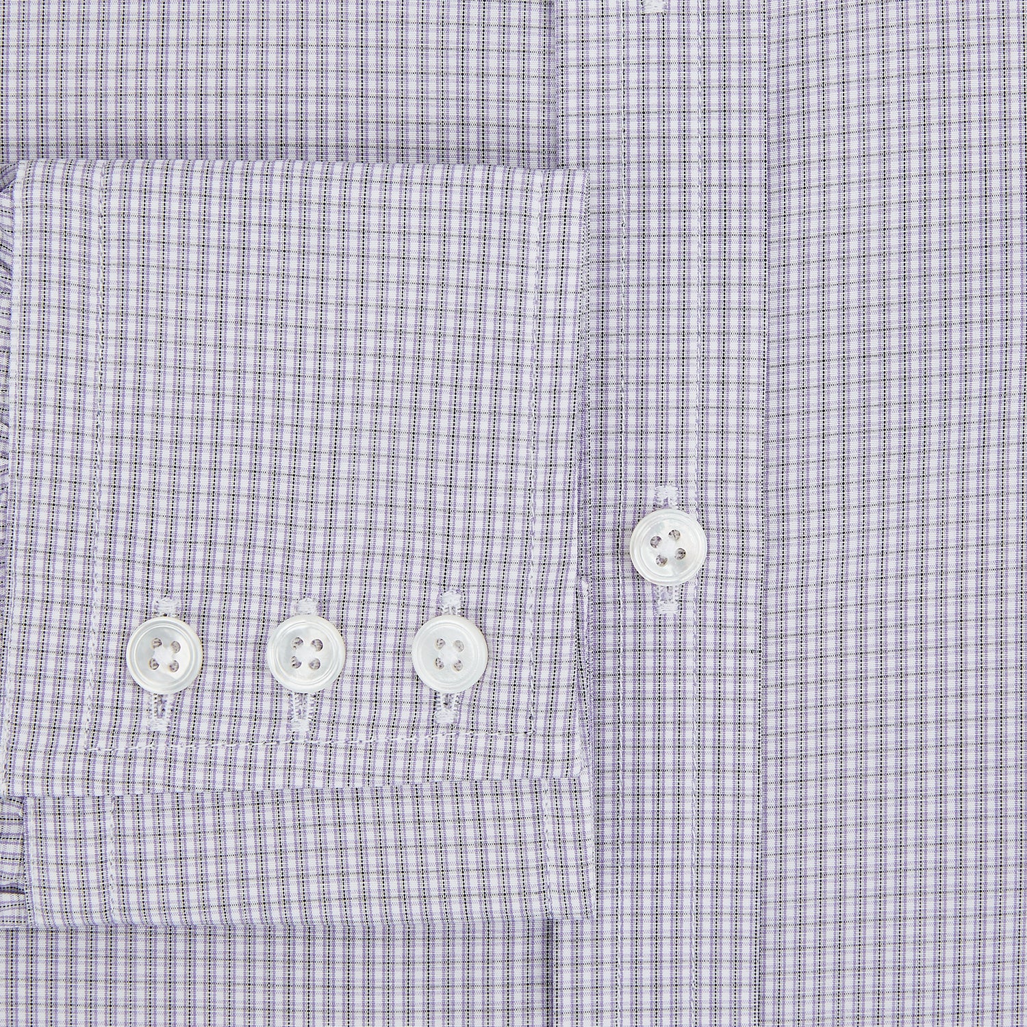 Image 4 of product The Turnbull & Asser Purple Micro Check Mayfair Shirt features long sleeves, button-up front, pointed collar, and buttoned cuffs in a subtle lilac and white check, exemplifying British craftsmanship and displayed on a white background.
