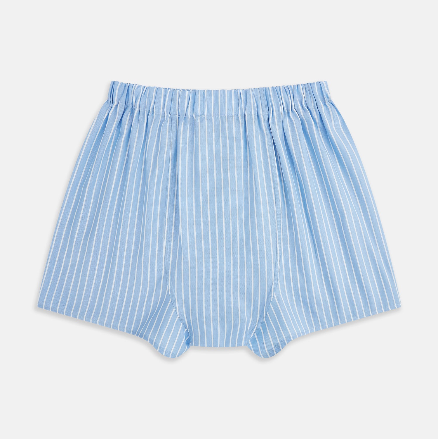 Image 2 of product Turnbull & Asser White and Blue Stripe Godfrey Boxer Shorts, crafted from premium Italian cotton with vertical white pinstripes, an elastic waistband, and a loose fit, are shown laid flat on a white background.