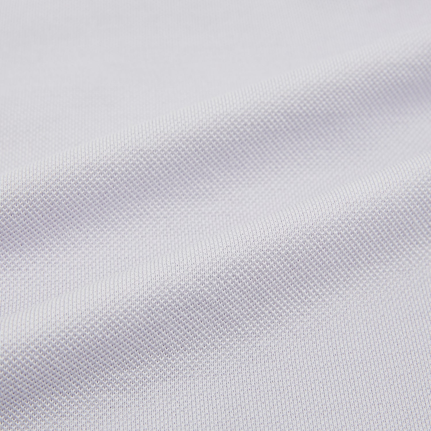 Image 5 of product A soft pink cotton polo shirt by Turnbull & Asser features short sleeves, a contrasting white collar, three dark buttons, and a left chest pocket. Laid flat on a white background—it’s perfect for modern men’s fashion.
