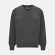 The Charcoal Grey Cashmere V-neck Jumper by Turnbull & Asser features ribbed cuffs, hem, and neckline—an essential knitwear piece, shown on a white background.