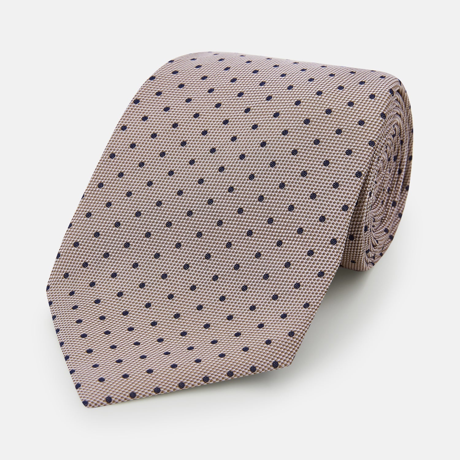 Image 1 of product The Turnbull & Asser Navy and Lilac Micro Dot Silk Tie, featuring subtle micro dots, is the perfect refined accessory for smart outfits, shown rolled up against a plain white background.
