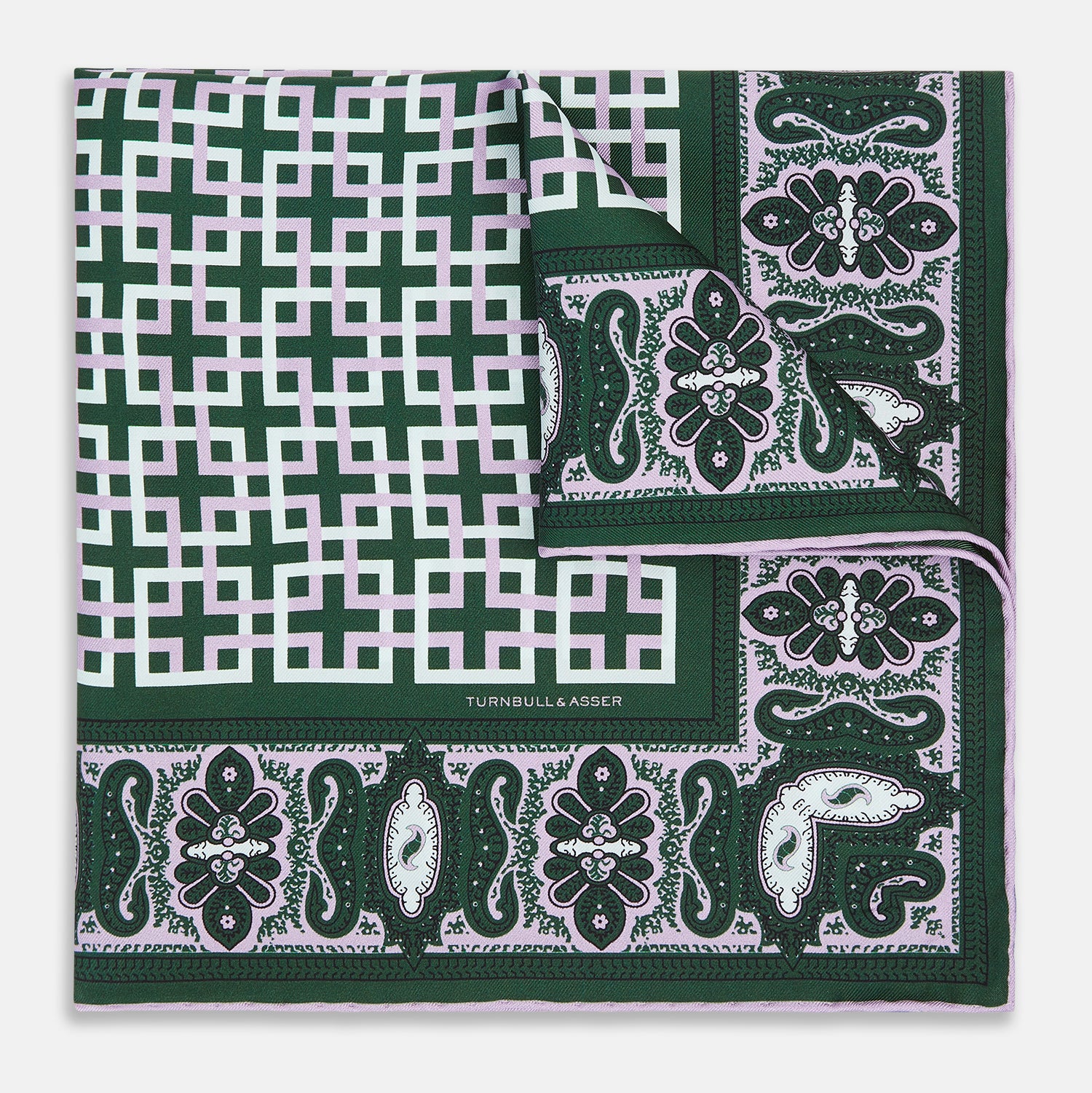 Image 6 of product The Forest Green Square-Patterned and Paisley Silk Pocket Square by Turnbull & Asser features geometric and paisley designs, is handcrafted in England, and has the brand printed near the edge.