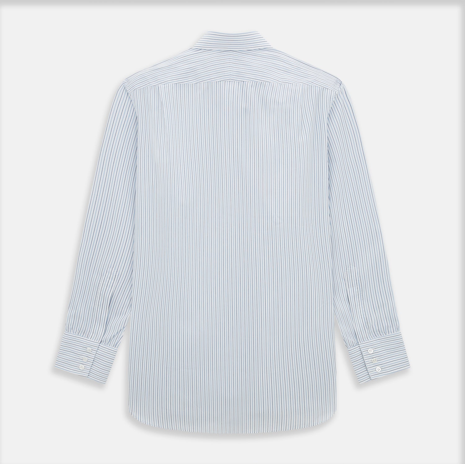 Image 3 of product The Turnbull & Asser Navy and Blue Shadow Stripe Mayfair Shirt, featuring a classic T&A collar and buttoned cuffs, is laid flat on a white background.
