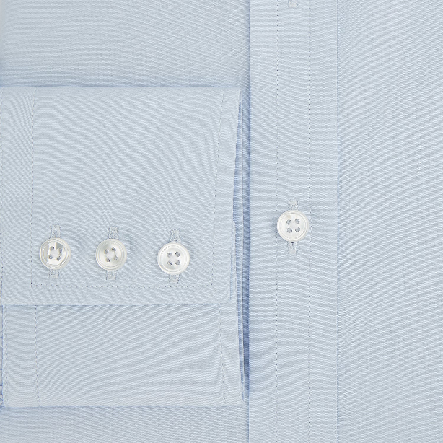 Image 4 of product The Turnbull & Asser Pale Blue Cotton Regular Fit Mayfair Shirt features a classic collar, white buttons, and buttoned cuffs. This long-sleeve dress shirt displays the timeless Mayfair silhouette for a refined look.