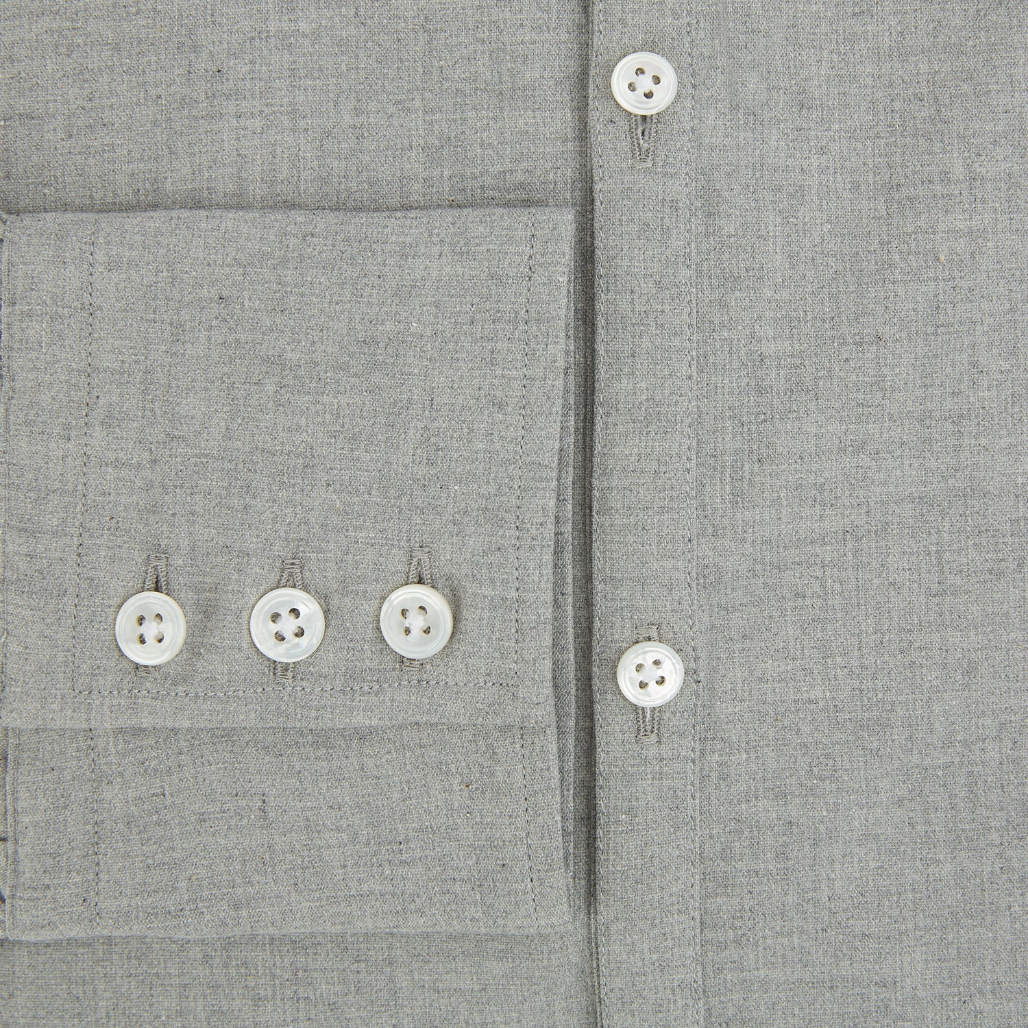 Image 4 of product The Grey Westminster Shirt by Turnbull & Asser features a classic collar and white buttons, expertly crafted in Britain. This long-sleeve button-up is shown against a plain white background.