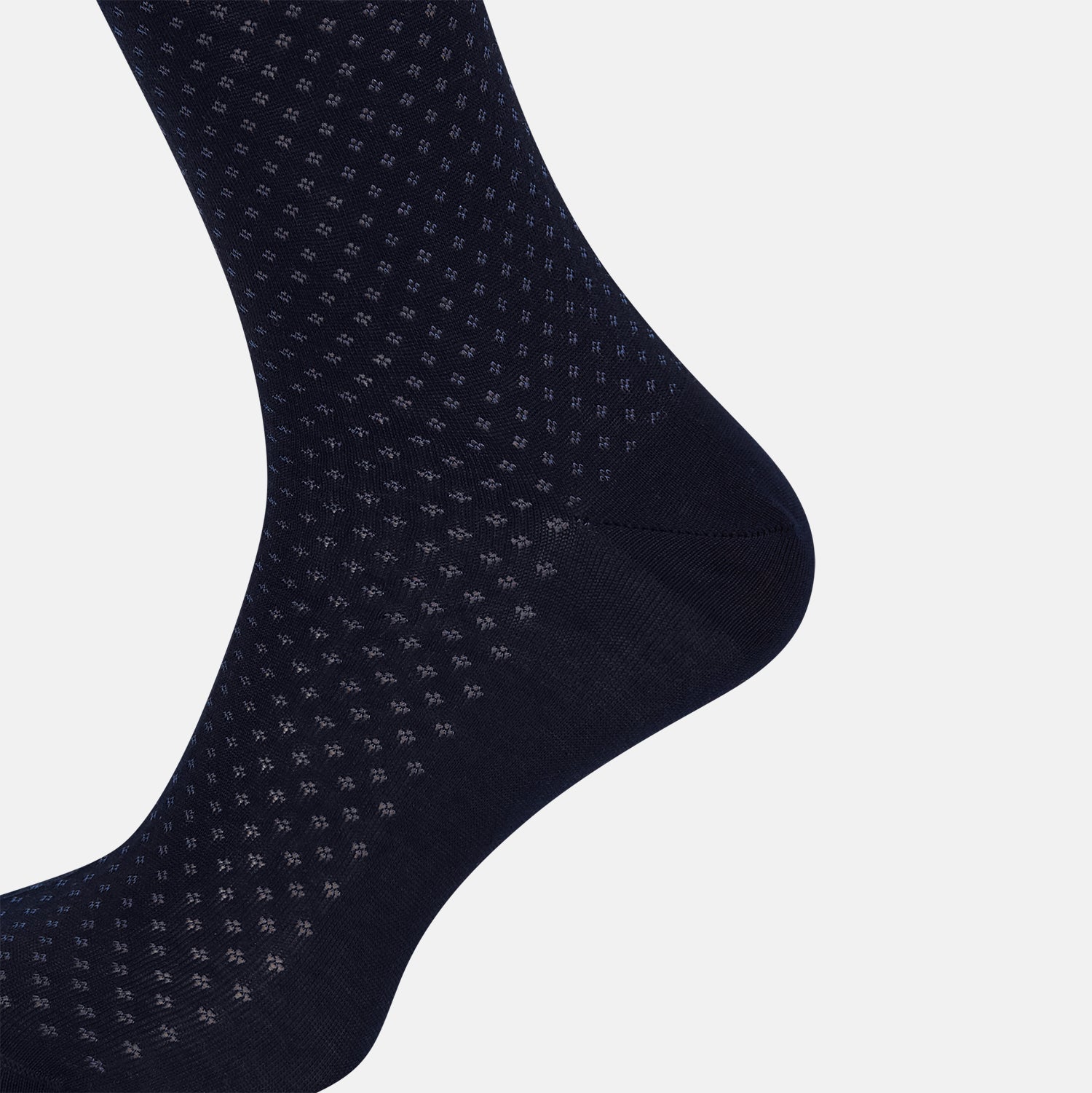 Image 4 of product The Turnbull & Asser Midnight Motif Mid-Length Sock is a single black knee-high made from mercerised Egyptian cotton, featuring a subtle dotted pattern, showcased on a plain white background.
