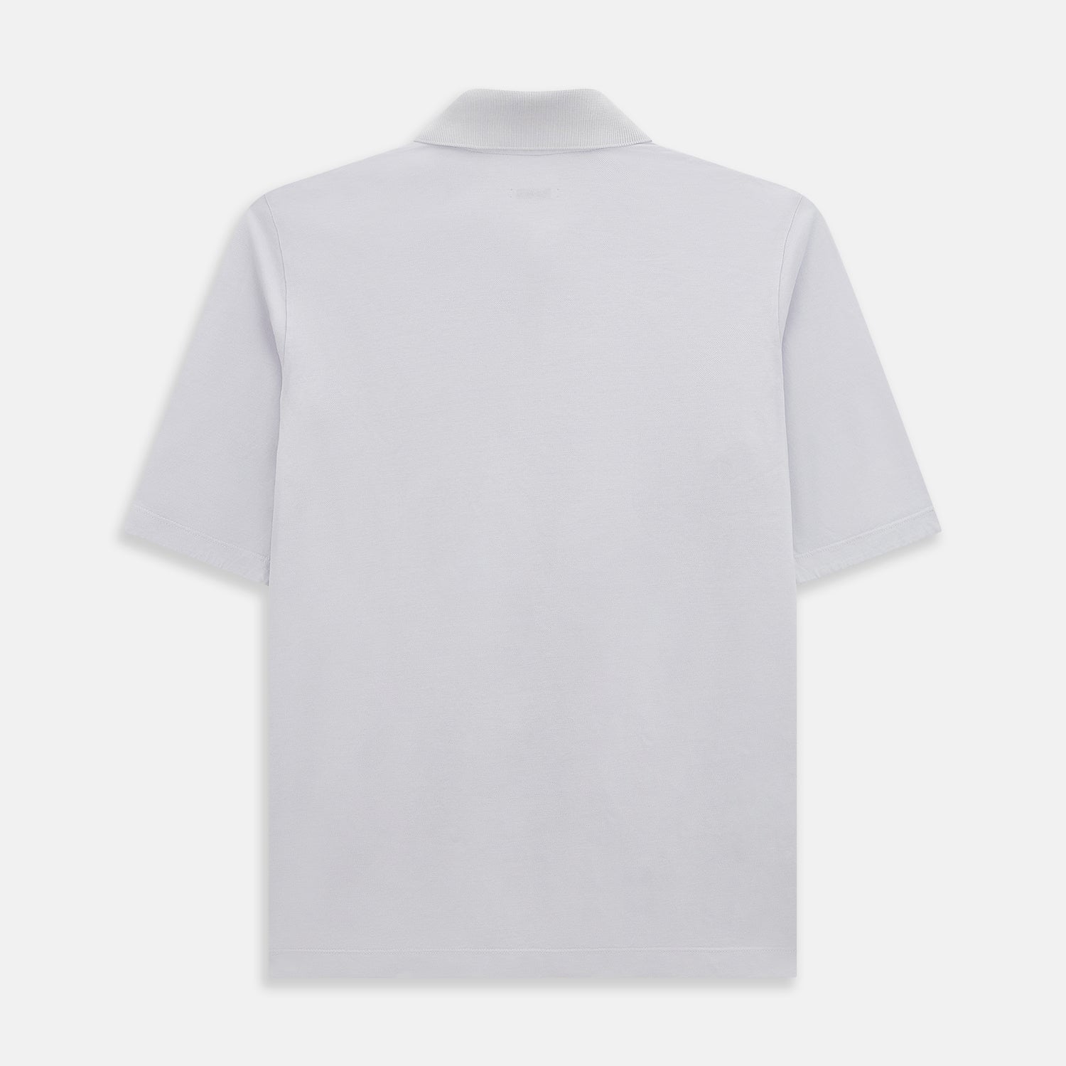 Image 3 of product A soft pink cotton polo shirt by Turnbull & Asser features short sleeves, a contrasting white collar, three dark buttons, and a left chest pocket. Laid flat on a white background—it’s perfect for modern men’s fashion.