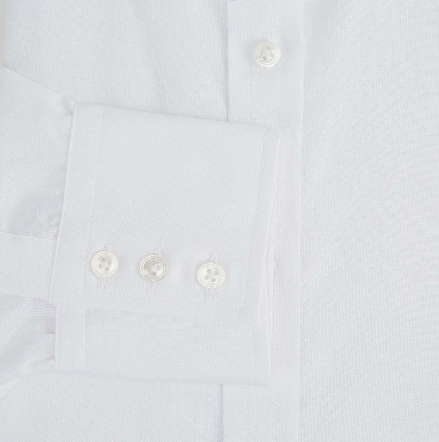 Image 3 of product The Turnbull & Asser White Superfine Oxford Cotton Shirt features a T&A collar and 3-button cuffs—ideal for elegant evening attire, shown against a white background.