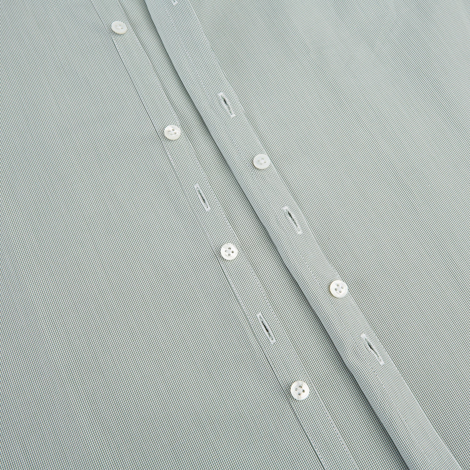 Image 7 of product A dark green micro graph check Westminster shirt by Turnbull & Asser, featuring fine British craftsmanship, a Turnbull collar, and white buttons, is laid flat on a white background.