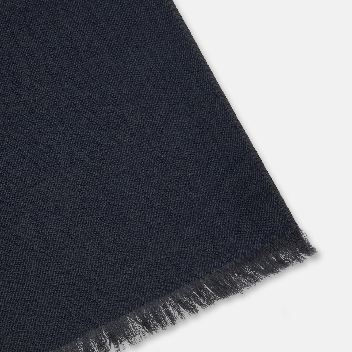 Image 2 of product The Turnbull & Asser Brown and Navy Cashmere Scarf features a long, rectangular shape, color block design, soft texture, and lightly frayed edges, elegantly folded on a plain white background.