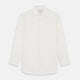The Cream Silk Whitby Shirt by Turnbull & Asser features a pointed collar, buttoned front and cuffs, and long sleeves, shown in Whitby Fit and laid flat on a white background.