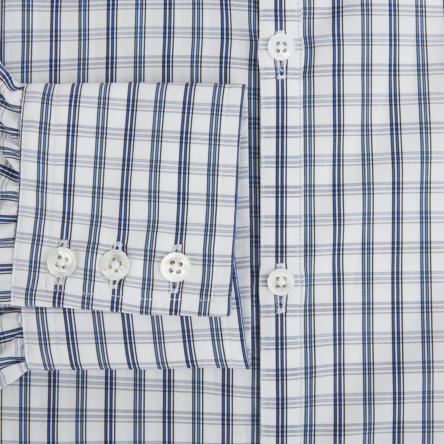 Image 4 of product The Azzurro Multi Check Westminster Shirt by Turnbull & Asser is a long-sleeve, button-up with a white base and blue and gray checks, displayed flat against a white background.