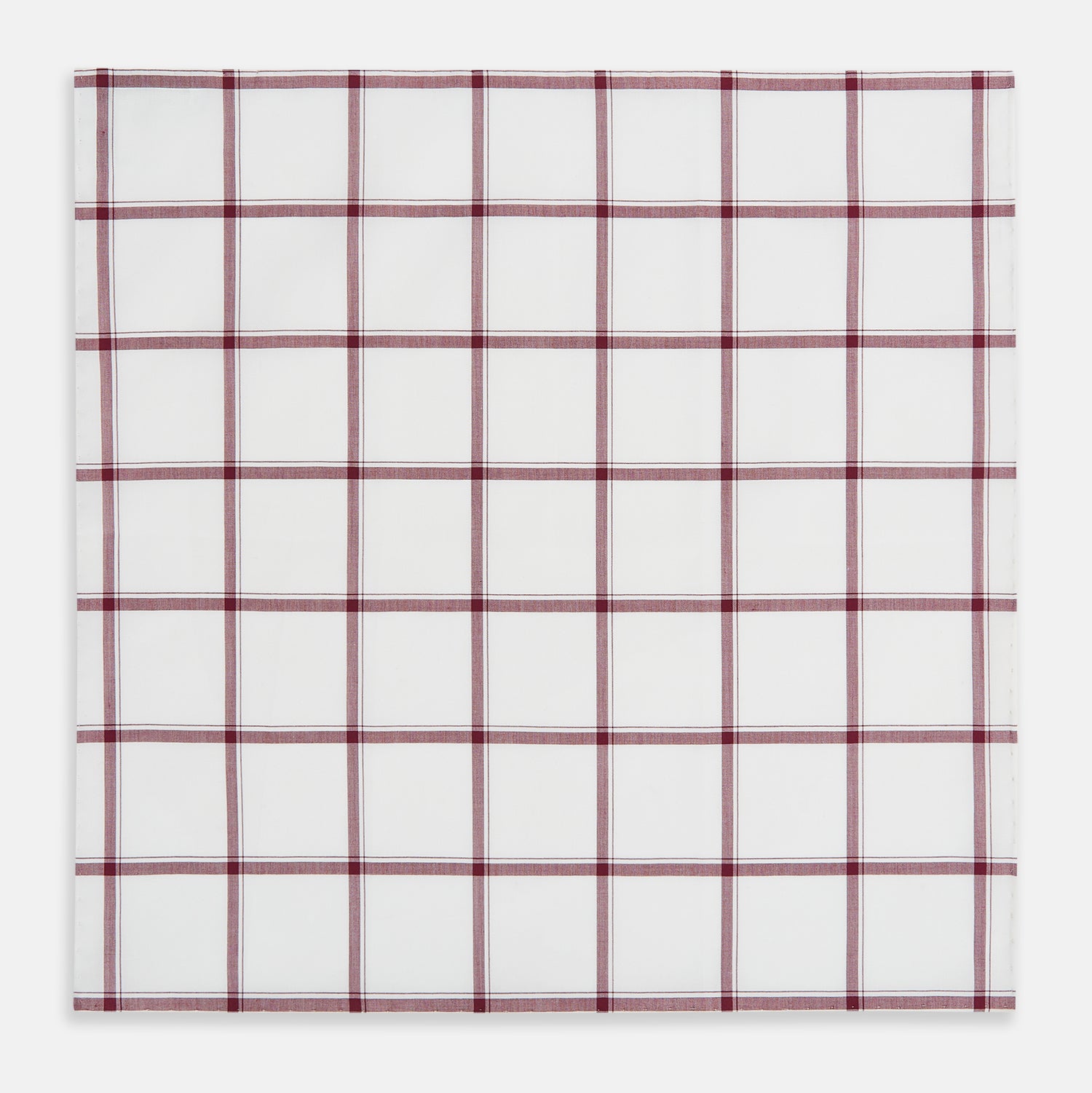 Image 3 of product The Turnbull & Asser Burgundy Grid Check Hand-Rolled Handkerchief features a white base with burgundy grid lines forming large squares and is finished with elegant hand-rolled edges.