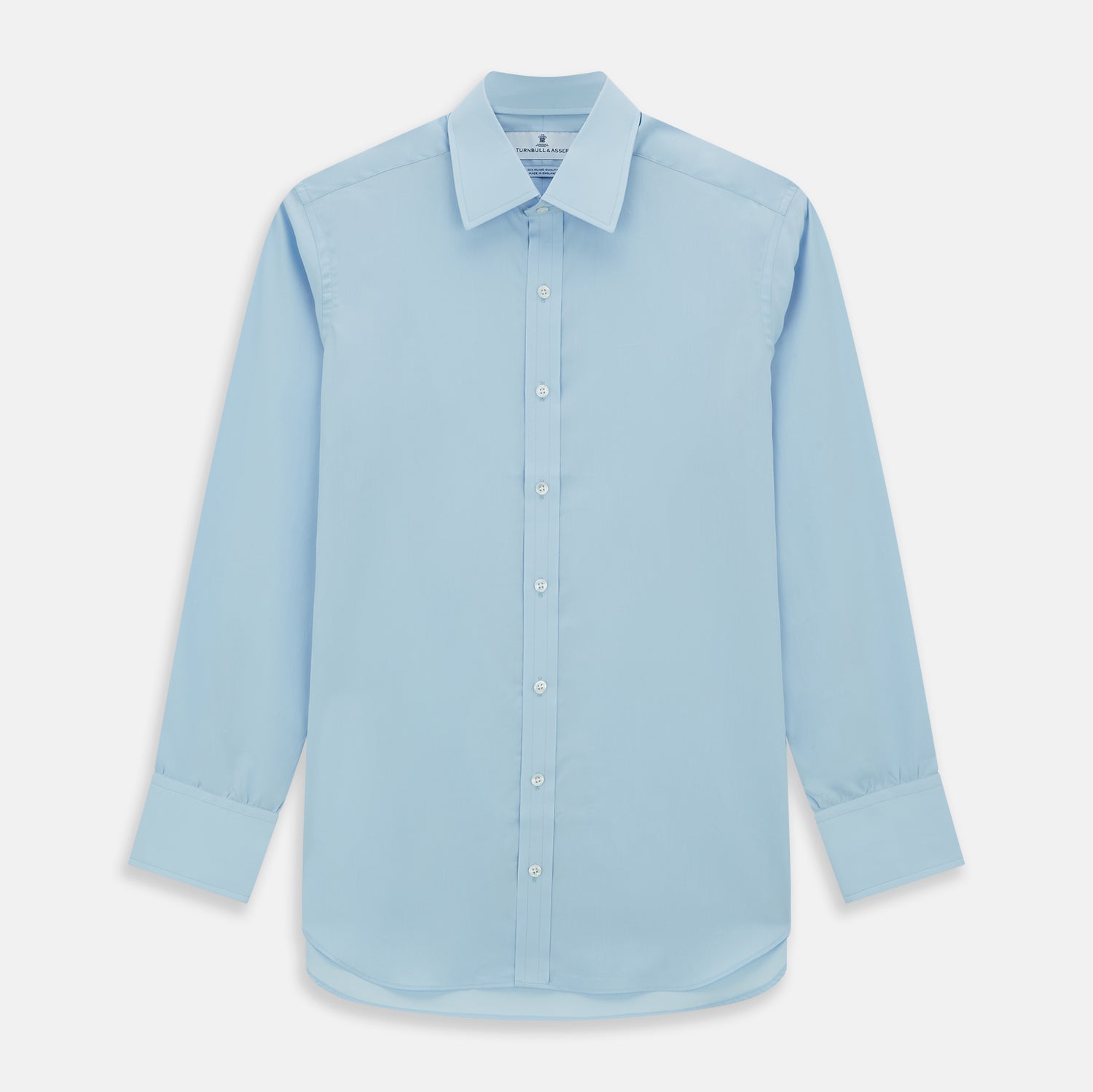 Image 1 of product The Turnbull & Asser Light Blue Sea Island Quality Cotton Shirt features a T&A collar, 3-button cuffs, and premium cotton fabric, shown laid flat against a white background.