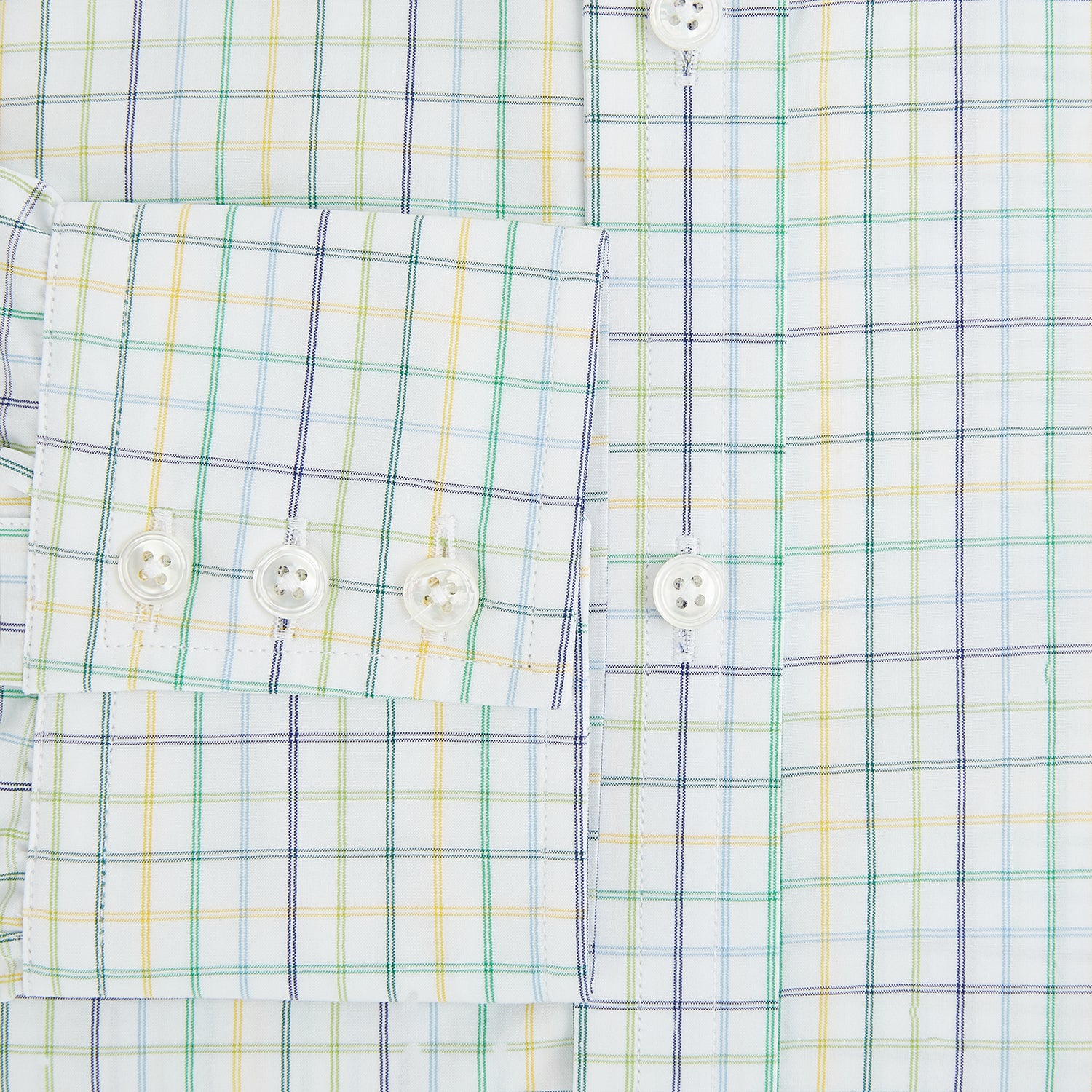 Image 4 of product The Turnbull & Asser Multi Tone Double Grid Check Mayfair Shirt is a long-sleeve, button-up with a classic collar, showcasing pure cotton light blue, green, and yellow grid checks on white, neatly displayed flat against a white surface.