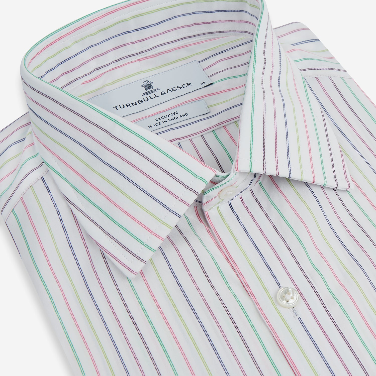 Image 2 of product The Turnbull & Asser Multicoloured Double Pinstripe Mayfair Shirt, made from organic cotton, features thin blue, green, and pink stripes on white and is displayed laid flat on a white surface.