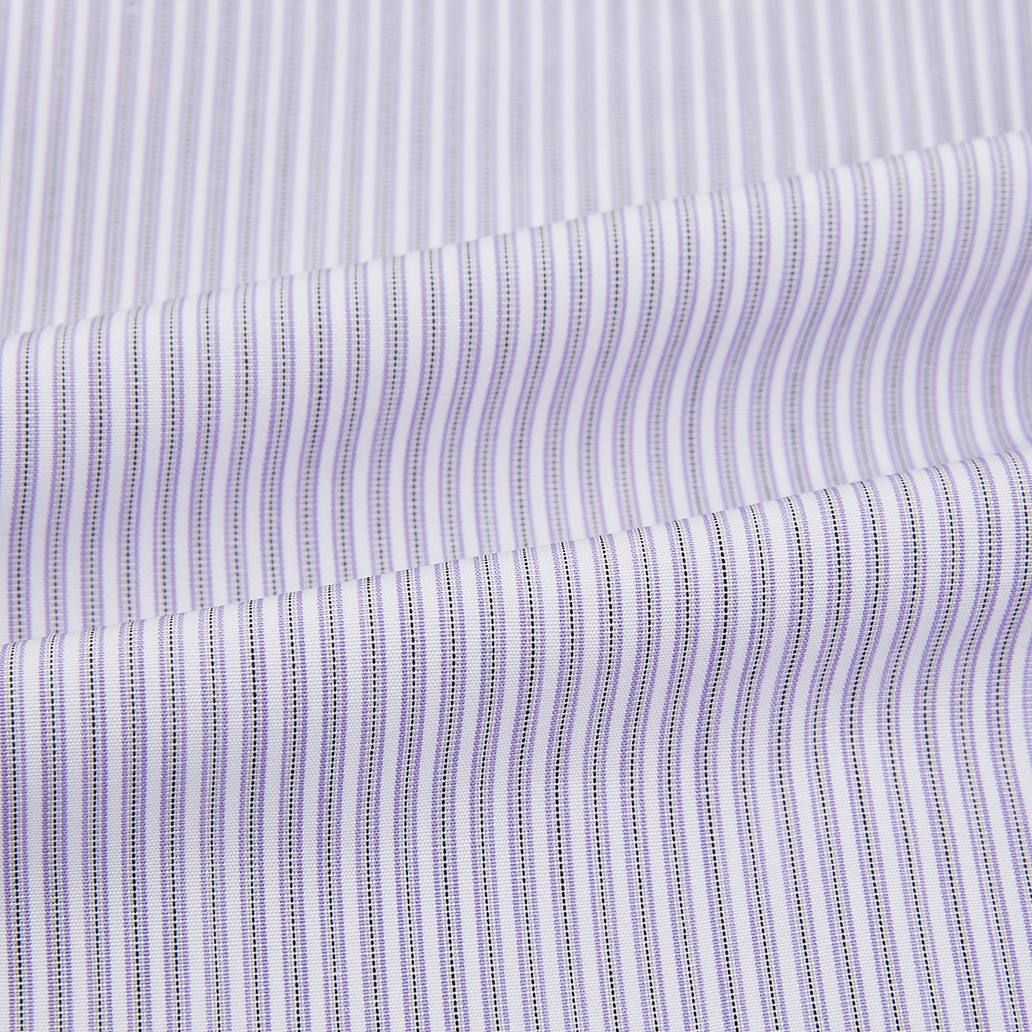 Image 6 of product The Lilac Halo Stripe Mayfair Shirt by Turnbull & Asser features a relaxed Mayfair fit, white buttons, a pointed collar, and a subtle lilac stripe pattern for timeless sophistication.