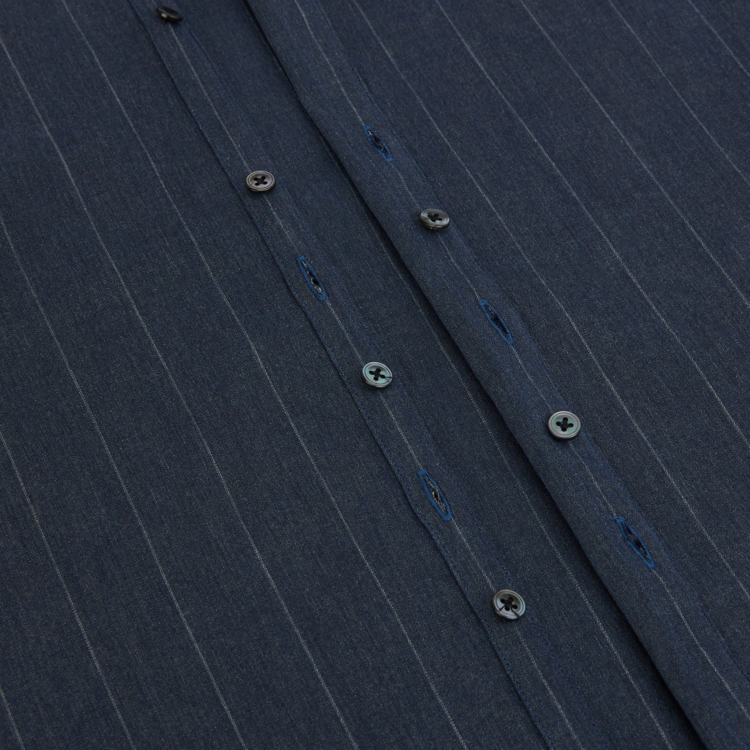 Image 7 of product The Turnbull & Asser Navy Melange Wide Stripe Westminster Shirt features a classic collar, buttoned cuffs, and a tailored fit, showcasing British craftsmanship. Laid flat on a white background.