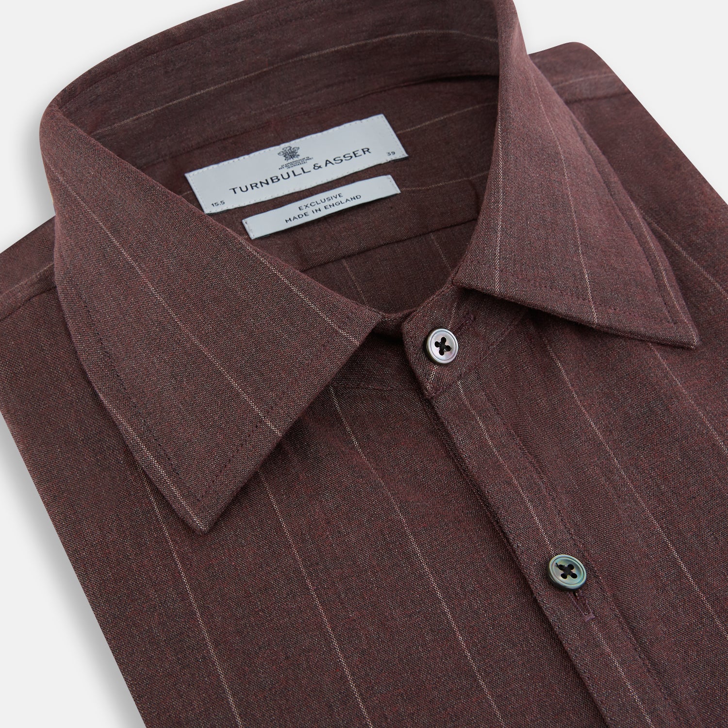 Image 2 of product The Indies Red Wide Stripe Westminster Shirt by Turnbull & Asser features wide red stripes, a classic collar, and a tailored fit, reflecting British craftsmanship. Displayed against a white background.