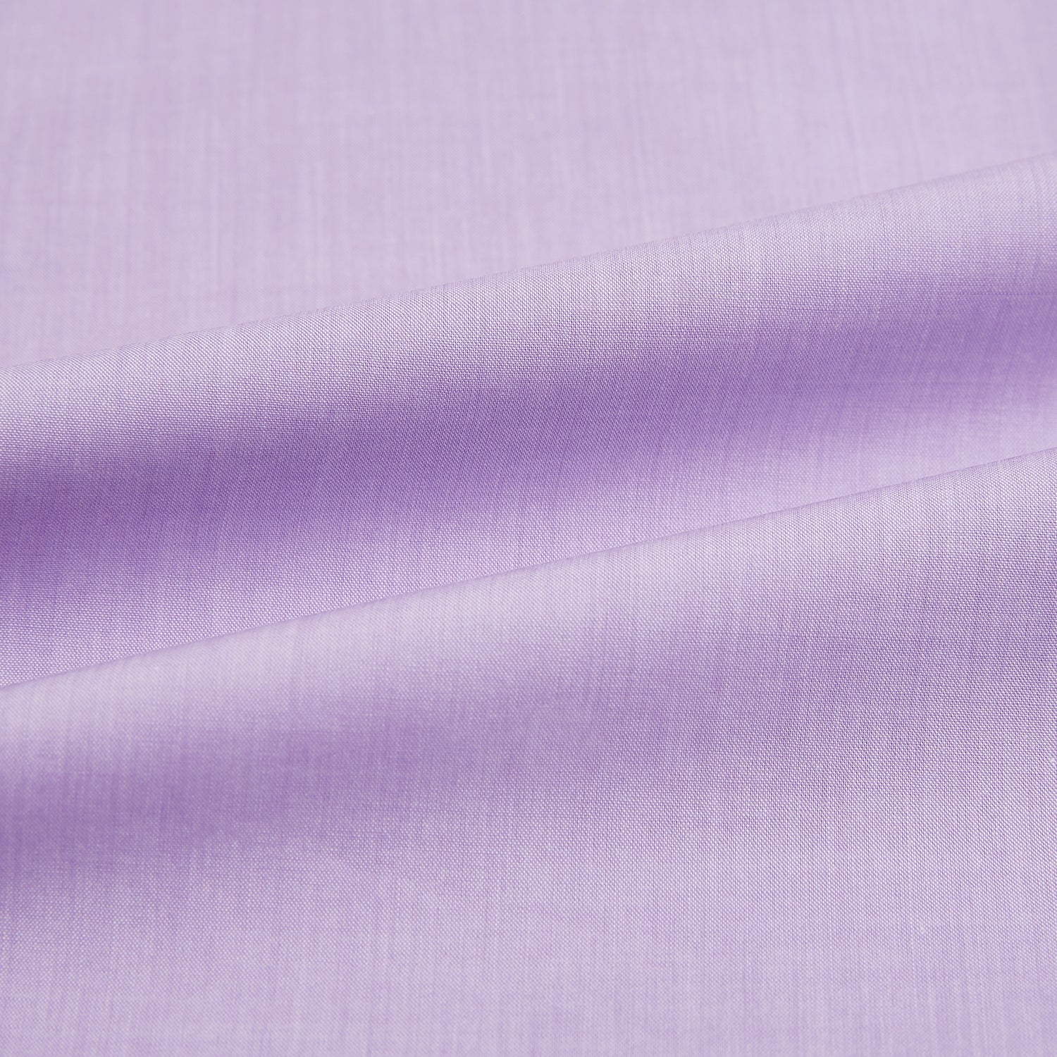 Image 6 of product The Turnbull & Asser Purple Pink Mayfair Shirt is a men's formal, long-sleeve button-up with a classic collar and buttoned cuffs, shown in light purple against a plain white background.