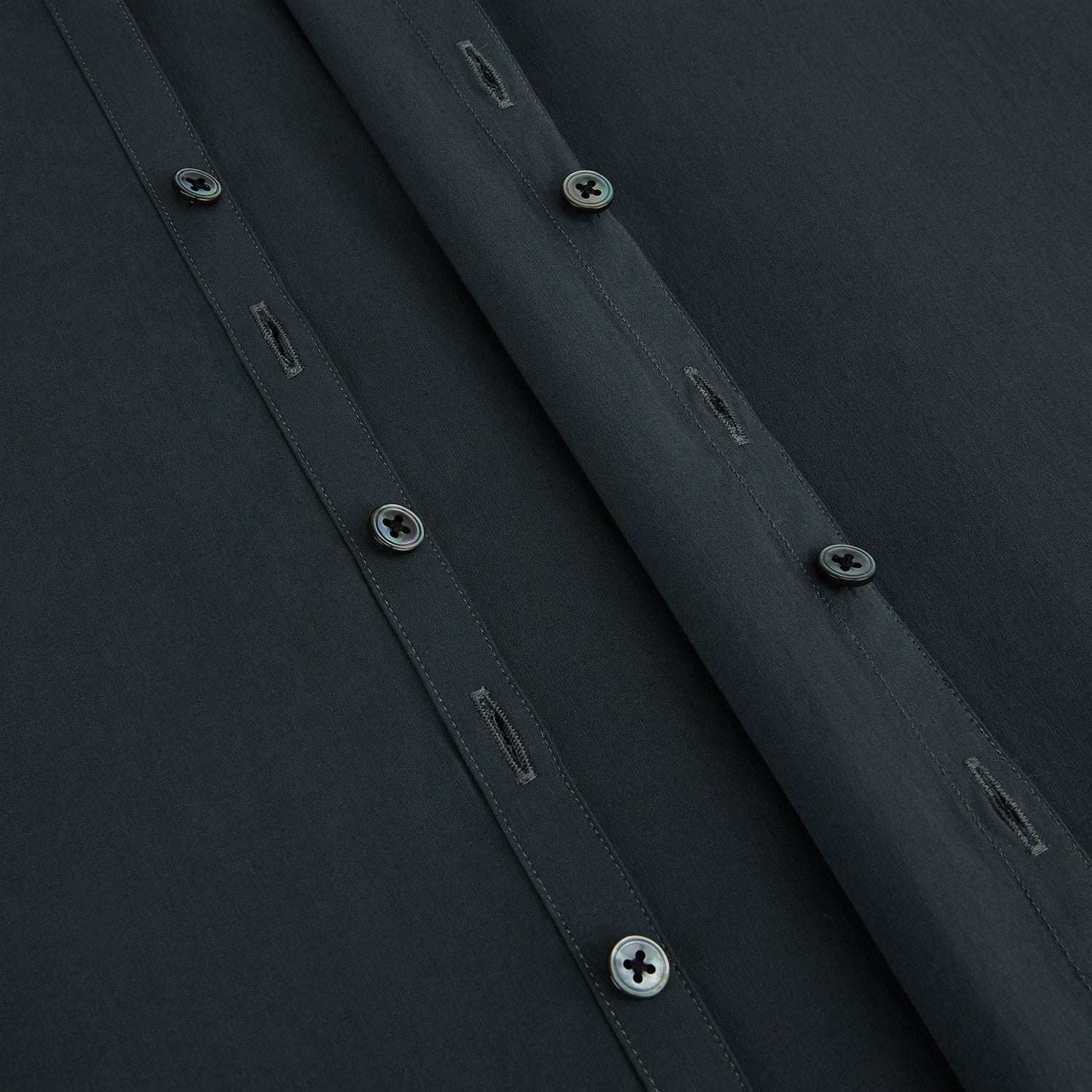 Image 7 of product The CHARCOAL WINDSOR SHIRT by Turnbull & Asser, featuring long sleeves, a button-up front, and a pointed collar, is displayed flat against a white background, reflecting classic British craftsmanship.