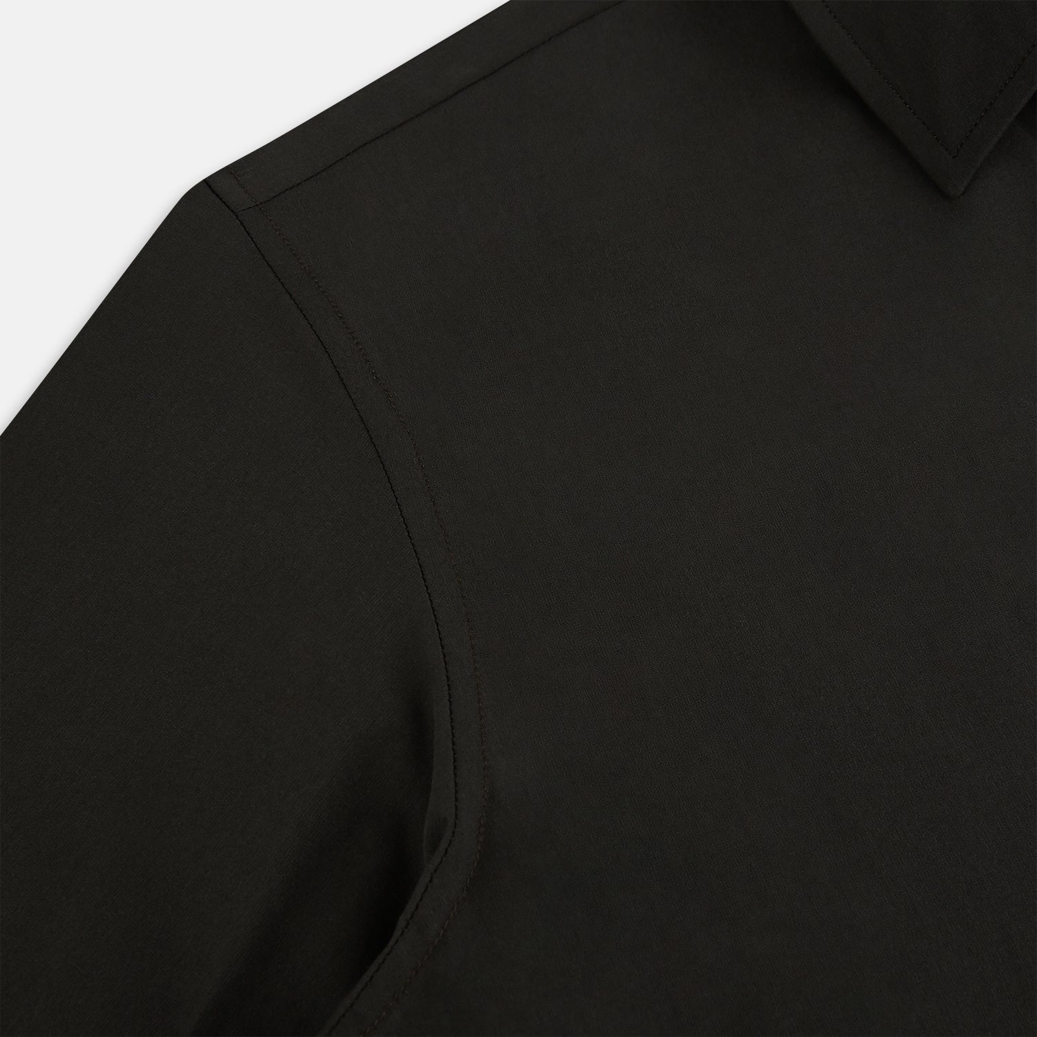 Image 6 of product A brown Windsor long-sleeve button-up shirt by Turnbull & Asser with a classic collar, buttoned cuffs, and a straight hem, laid flat on a white background—showcasing refined British craftsmanship.
