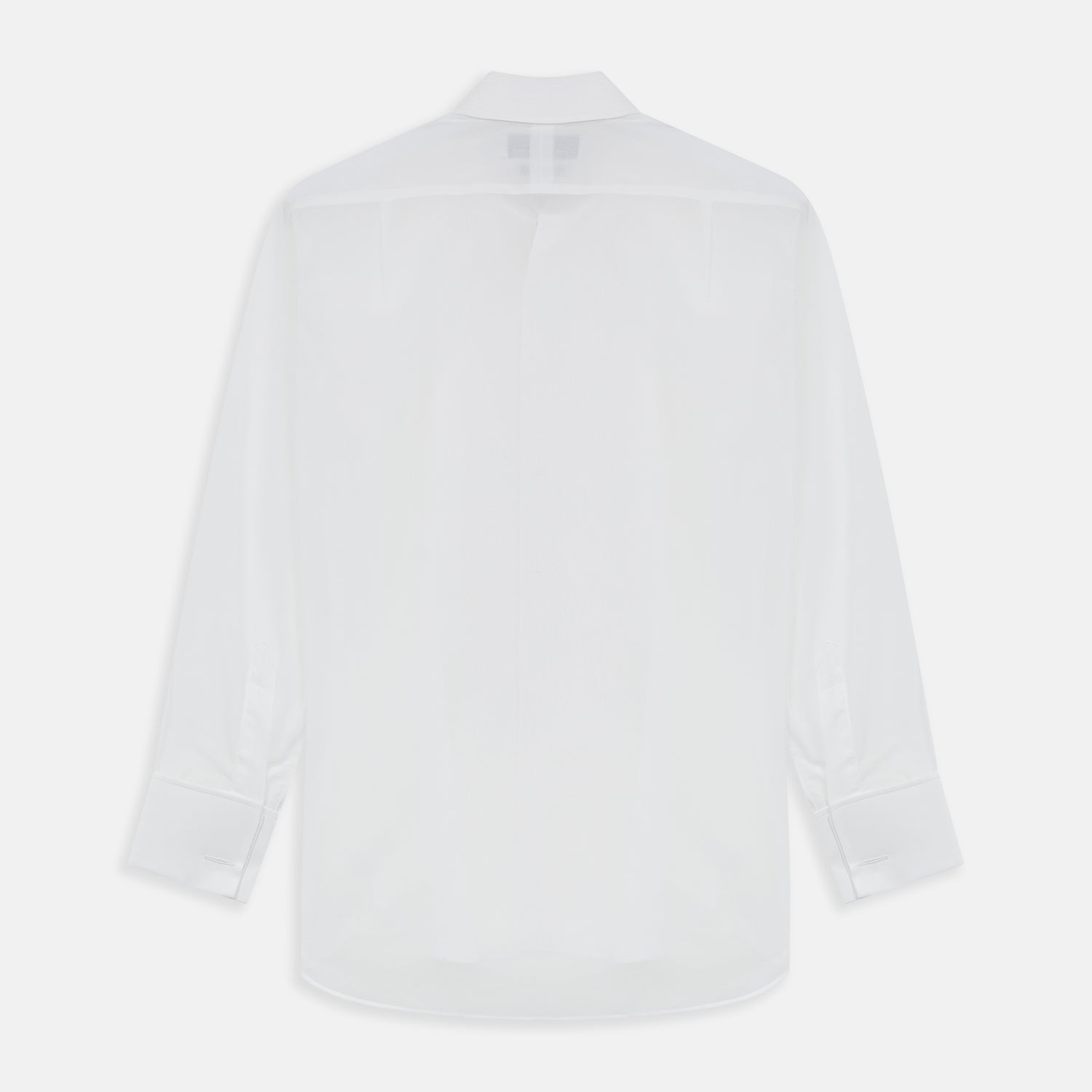 Image 9 of product The Die Another Day Inspired Voile Dress Shirt by Turnbull & Asser features a white pleated front, button-down closure, and classic collar—laid flat on white to showcase its timeless James Bond style.
