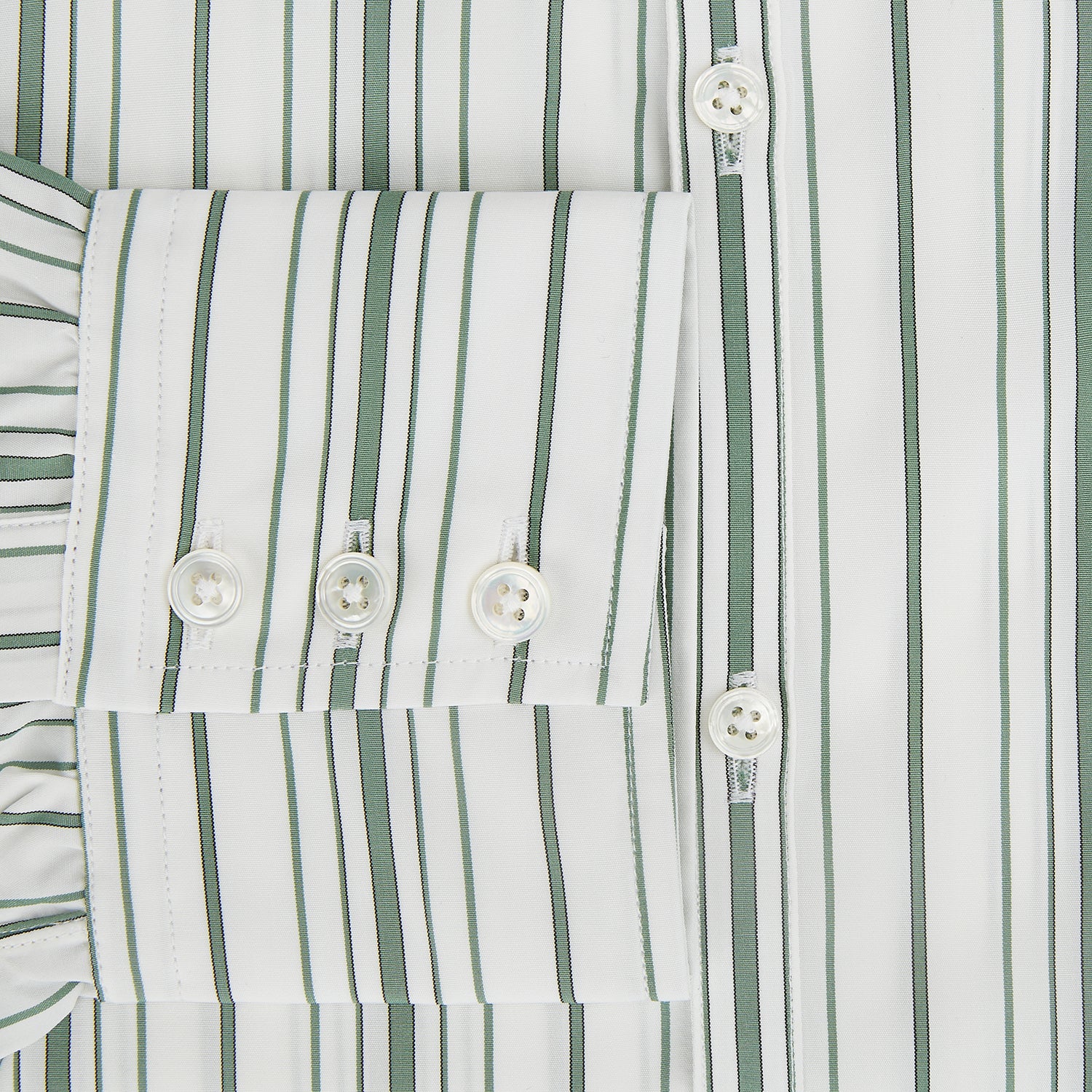 Image 4 of product The SAGE GREEN MULTI STRIPE WESTMINSTER SHIRT by Turnbull & Asser features a classic collar, long sleeves, buttoned cuffs, relaxed fit, and vertical green and white stripes—embodying timeless British craftsmanship.