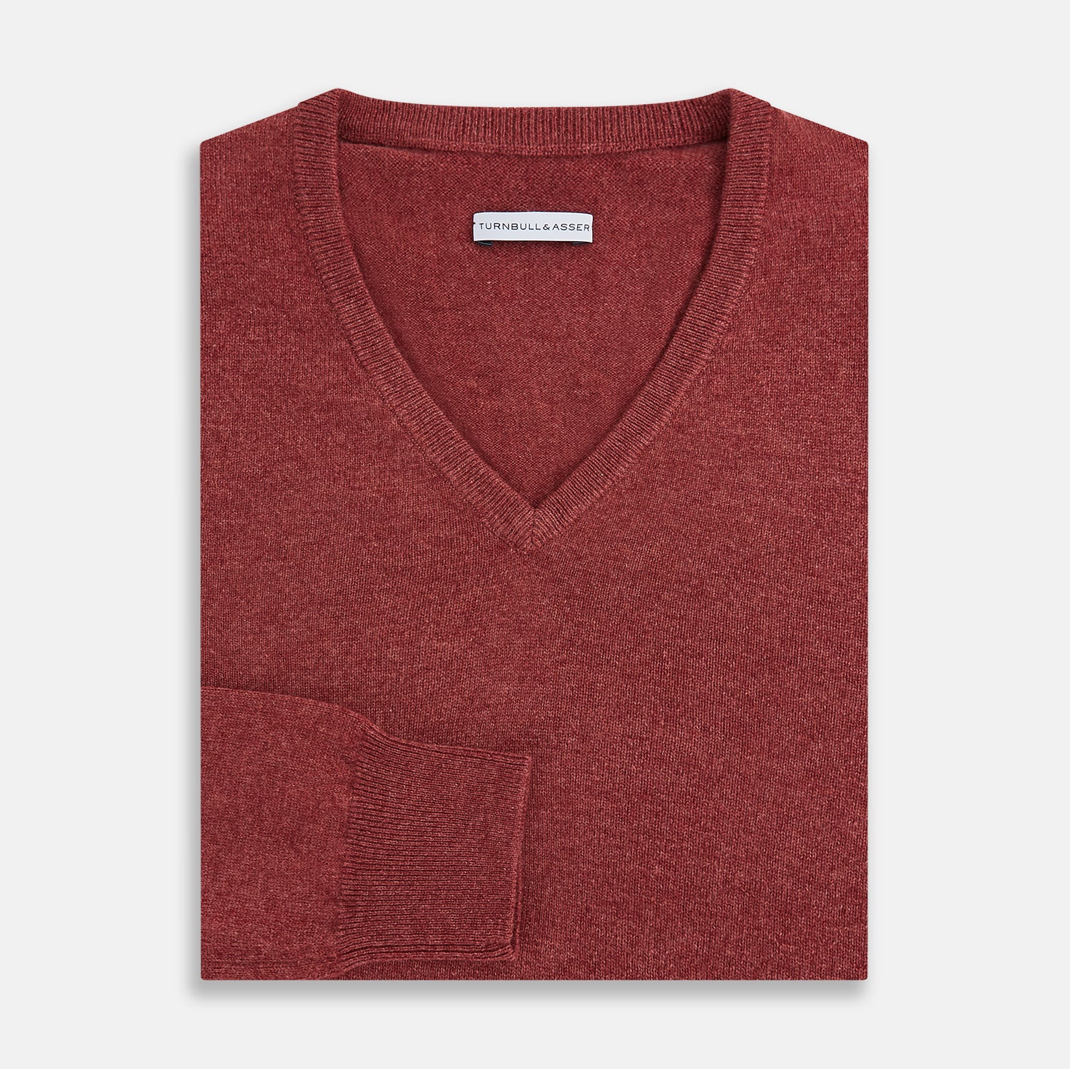 Image 4 of product The Turnbull & Asser Burgundy Crew V-Neck Cashmere Jumper is a long-sleeve knitwear piece with ribbed cuffs, hem, and neckline, shown on a white background.