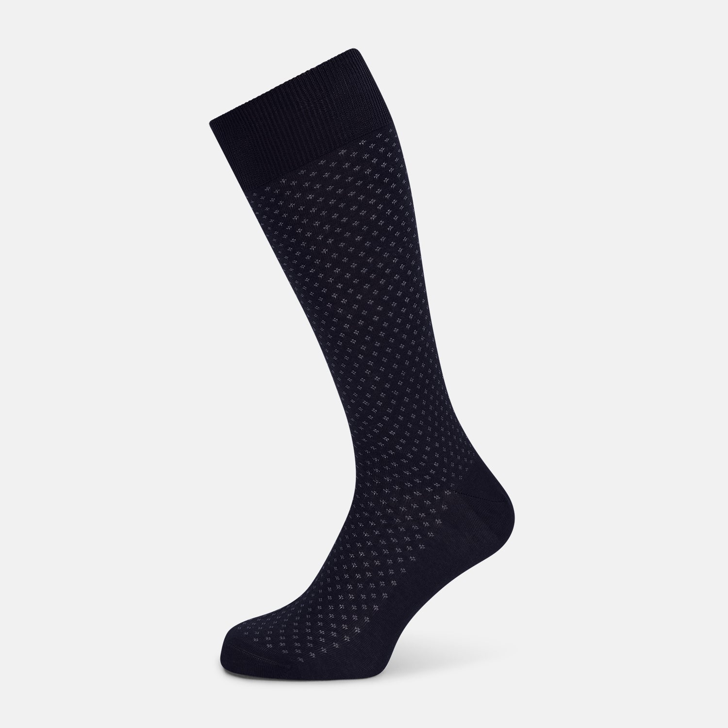 Image 1 of product The Turnbull & Asser Midnight Motif Mid-Length Sock is a single black knee-high made from mercerised Egyptian cotton, featuring a subtle dotted pattern, showcased on a plain white background.