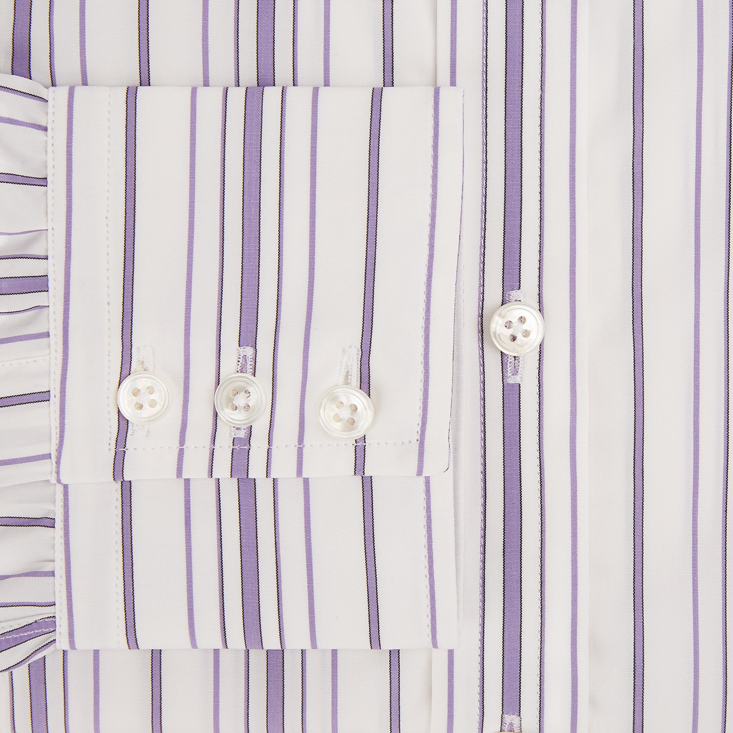 Image 4 of product The Purple Multi Stripe Mayfair Shirt by Turnbull & Asser is a long-sleeve, collared button-up featuring vertical blue and purple stripes on white, ideal for formal occasions. The shirt is neatly displayed flat against a white background.