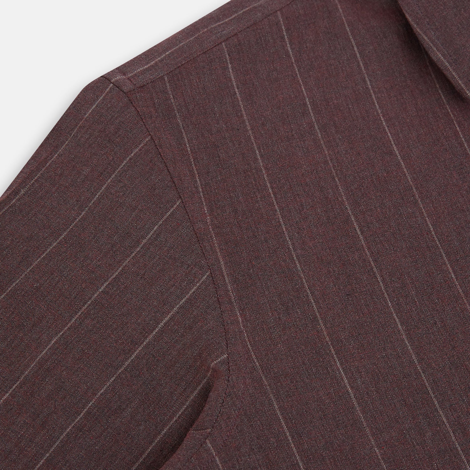 Image 6 of product The Indies Red Wide Stripe Westminster Shirt by Turnbull & Asser features wide red stripes, a classic collar, and a tailored fit, reflecting British craftsmanship. Displayed against a white background.