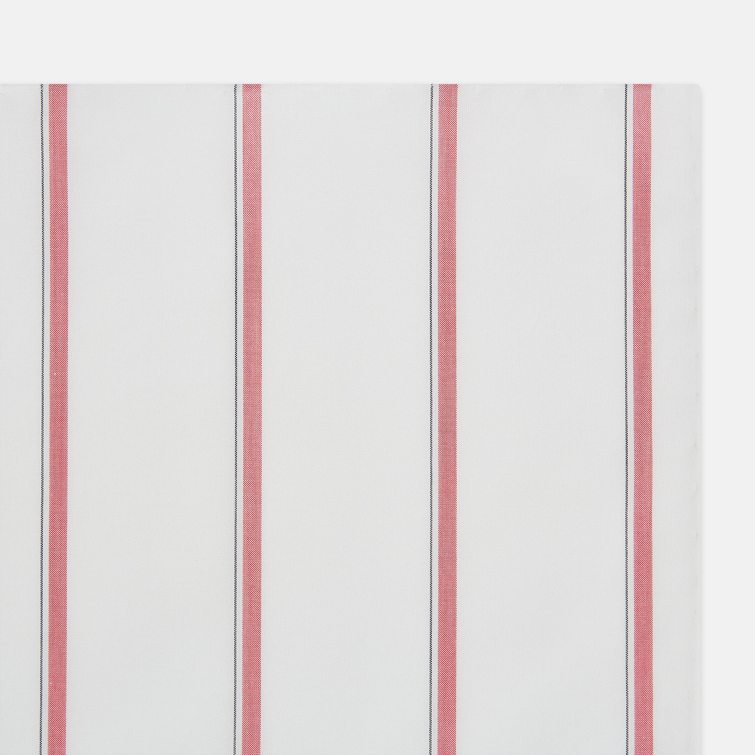 Image 2 of product The Turnbull & Asser Coral Track Stripe Hand-Rolled Handkerchief features evenly spaced vertical coral stripes bordered by thin gray lines, finished with hand-rolled edges and displayed neatly folded on a white background.