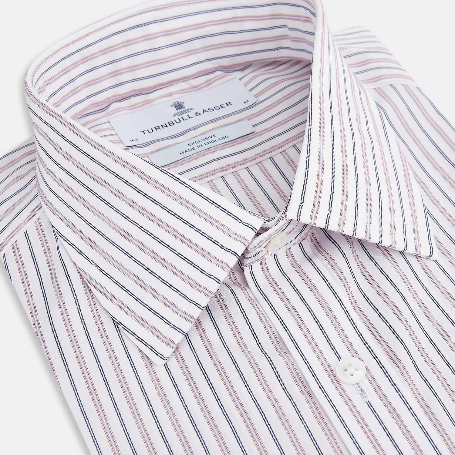 Image 2 of product The Turnbull & Asser Red Multi Stripe Mayfair Shirt is a long-sleeve, button-up classic with a sharp collar and vibrant red multi stripes—an essential men's piece shown against a white background.