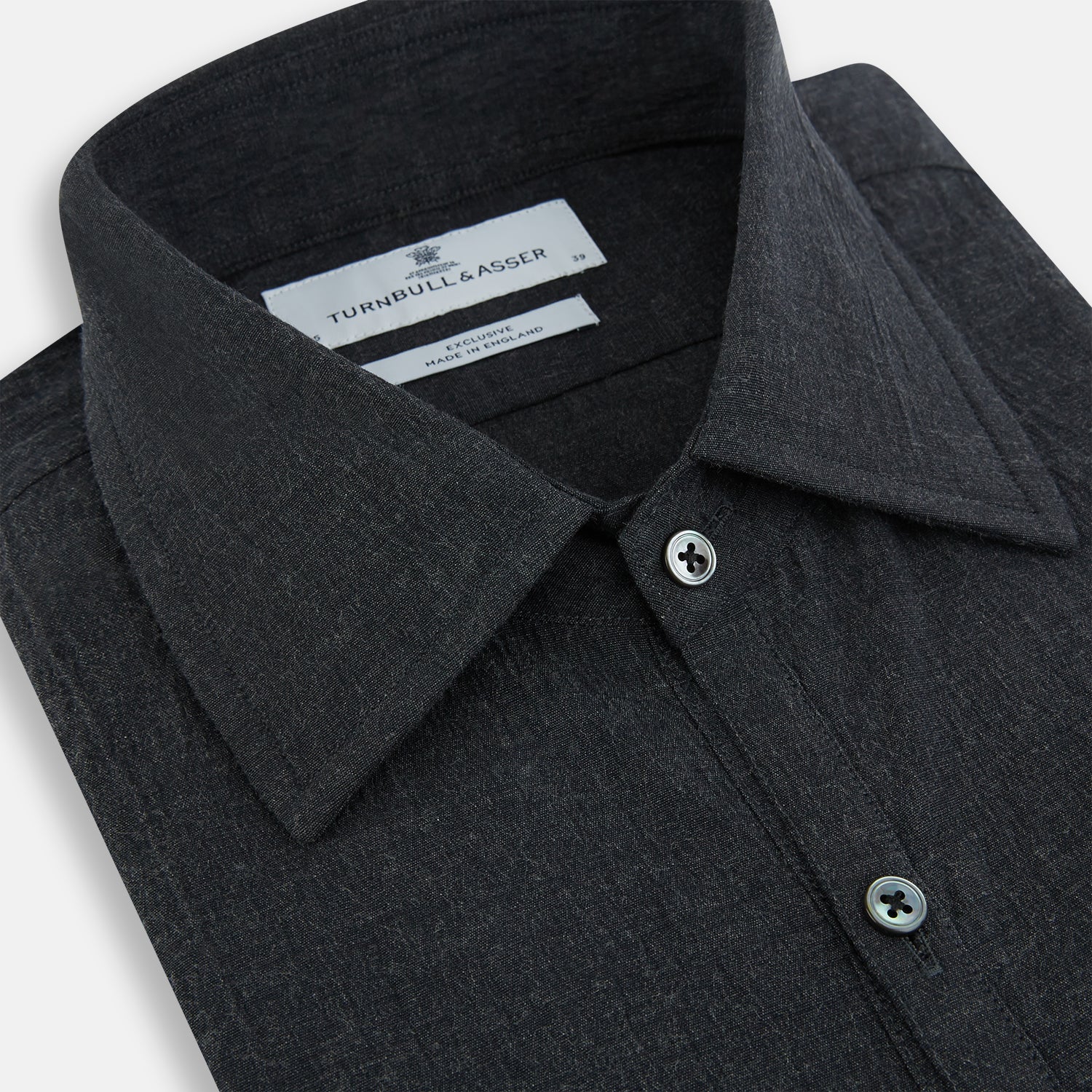 Image 2 of product The Turnbull & Asser Midnight Blue Westminster Shirt features long sleeves, a button-up front, classic collar, and buttoned cuffs in a plain design—showcasing British craftsmanship—laid flat on a white background.