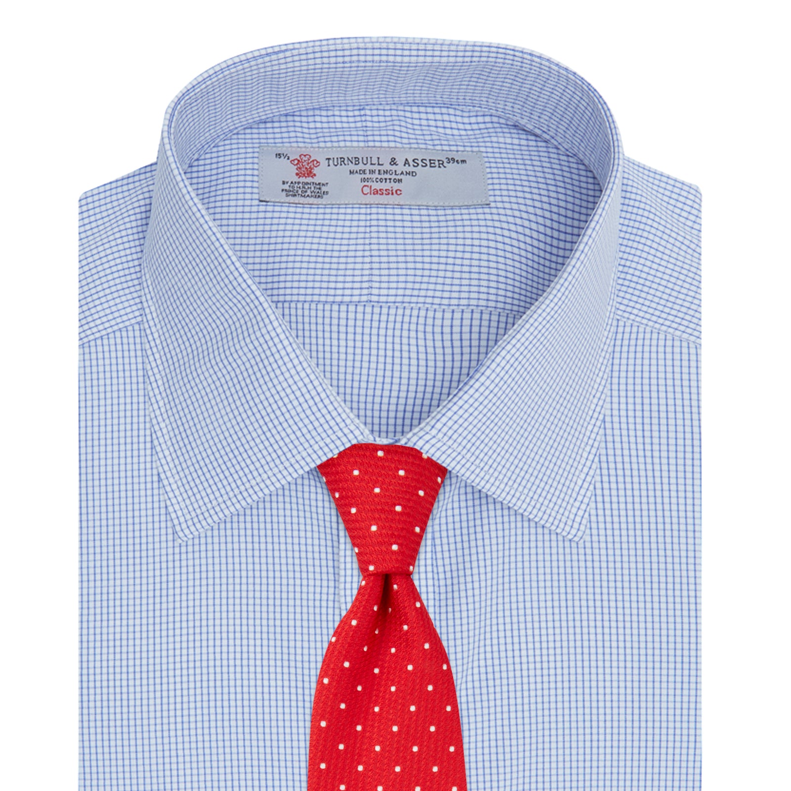 Image 6 of product A neatly folded Turnbull & Asser Blue Grid Check Shirt features a T&A collar, 3-button cuffs, white buttons, and subtle British style. The blue and white check cotton design displays the brand label inside the collar.