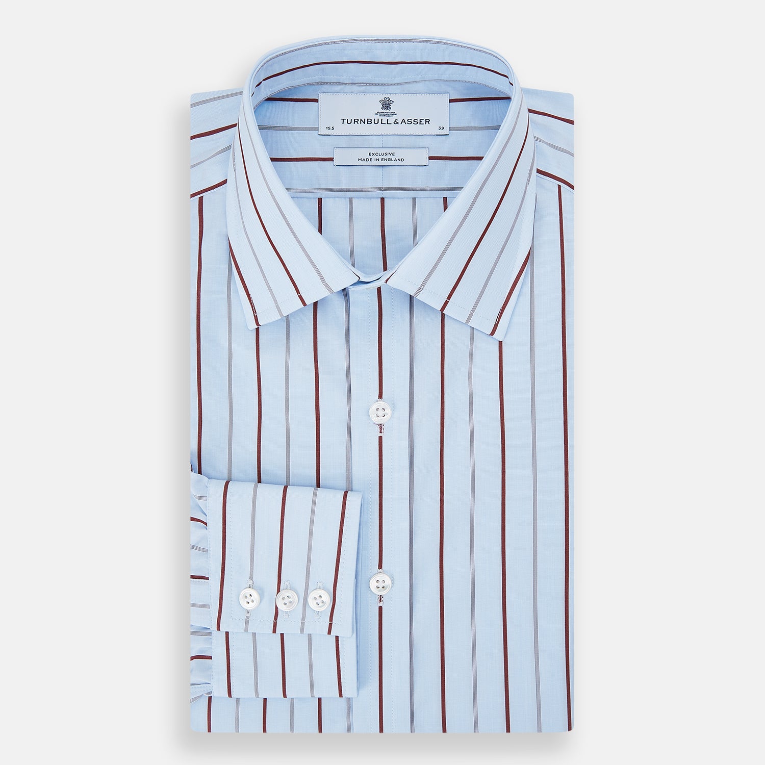 Image 5 of product The Turnbull & Asser Burgundy Wide Pinstripe Mayfair Shirt features a collared, long-sleeve design with bold vertical stripes, crafted in the refined Mayfair fit and displayed on a plain white background.