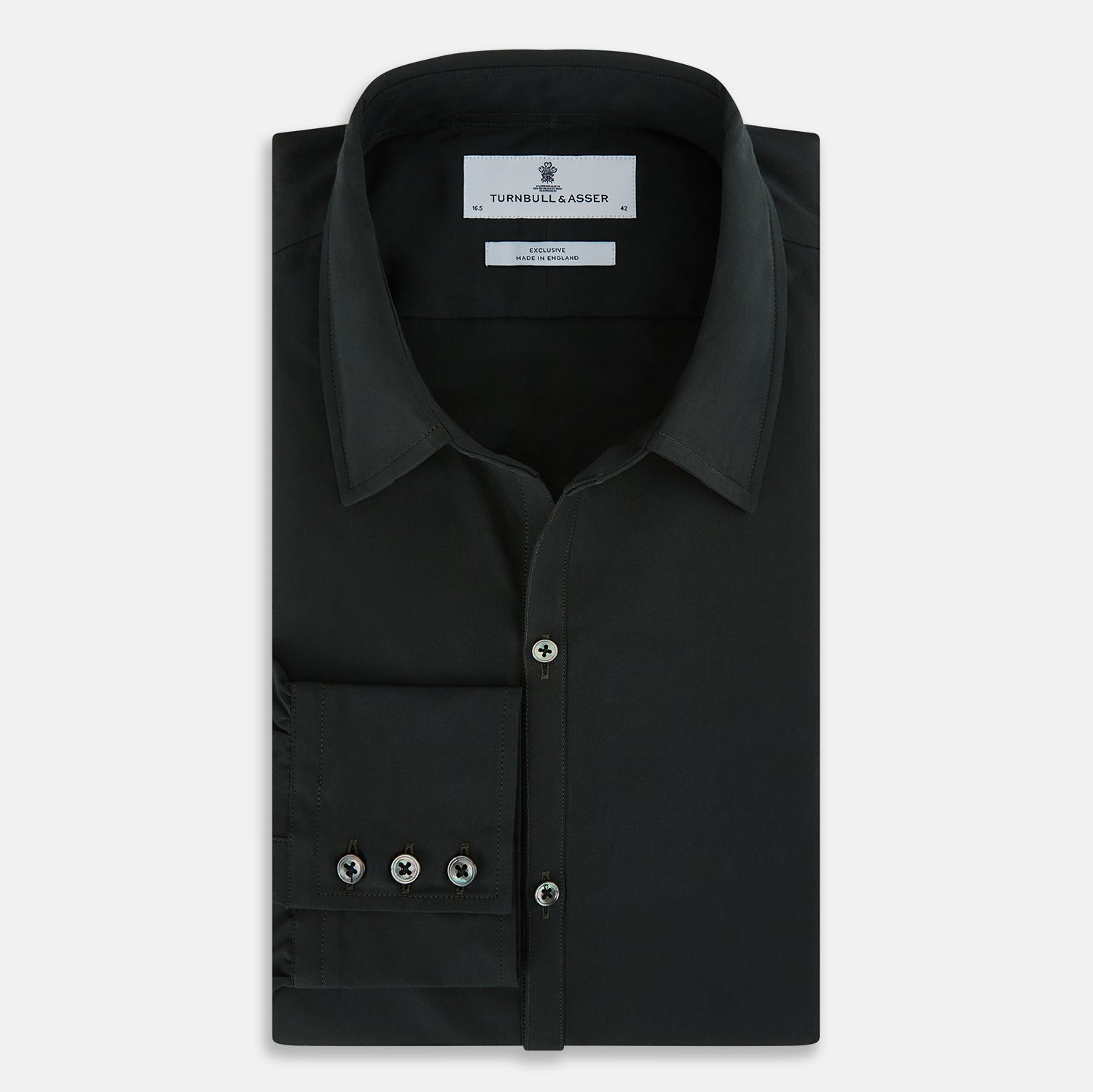 Image 5 of product The FOREST GREEN WINDSOR SHIRT by Turnbull & Asser features long sleeves, a Windsor collar, and buttoned cuffs, reflecting British craftsmanship. Displayed on a plain white background.