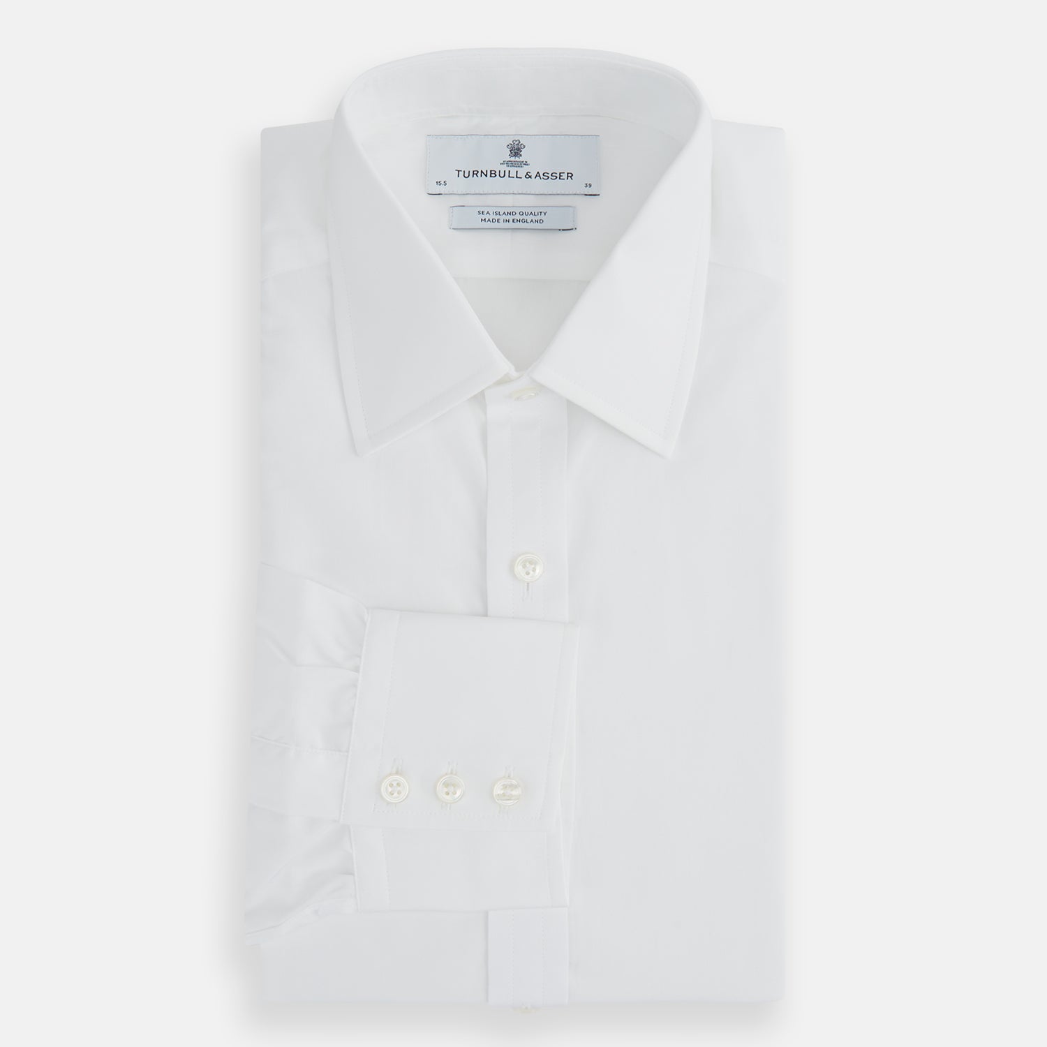 Image 5 of product The Turnbull & Asser White Sea Island Quality Cotton Shirt features a T&A collar and 3-button cuffs, crafted from luxurious cotton and displayed on a white background.
