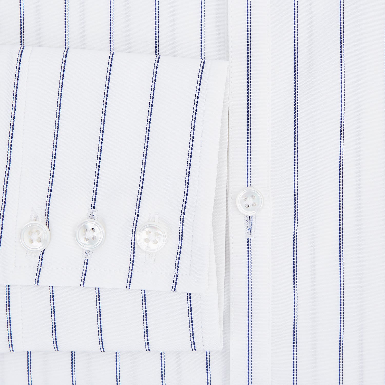Image 4 of product The Dark Navy Double-Pinstripe Westminster Shirt by Turnbull & Asser, featuring a Turnbull collar and cuffed sleeves, is displayed laid flat on a plain white background, highlighting its British craftsmanship.