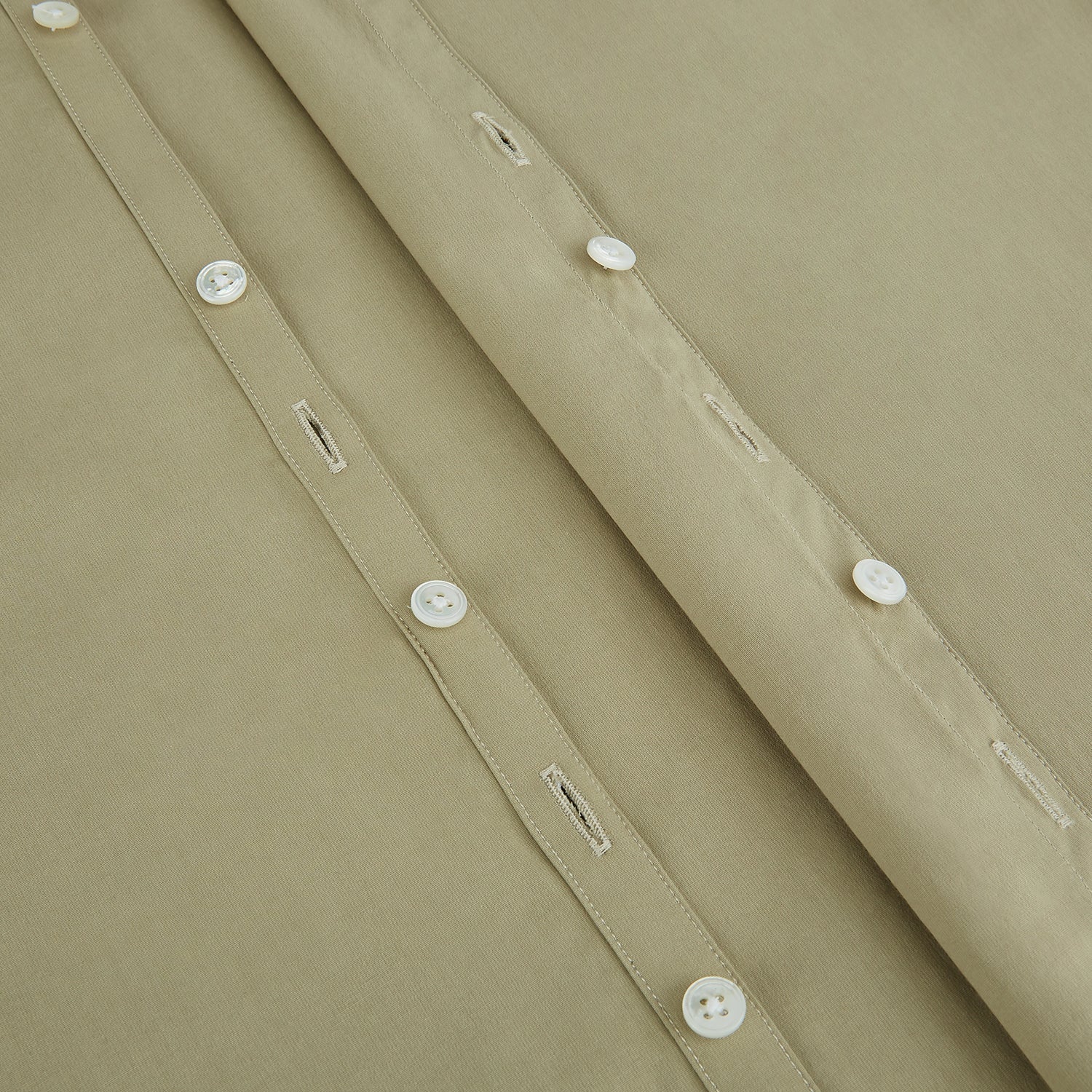 Image 7 of product The TAUPE WINDSOR SHIRT by Turnbull & Asser features a Windsor collar and buttoned cuffs. This long-sleeve shirt showcases refined British design and is displayed flat on a white background.