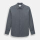 The Turnbull & Asser Azzurro Westminster Shirt in dark grey features long sleeves, a classic collar, buttoned cuffs, and a straight hem, showcased against a white background, highlighting refined British craftsmanship.