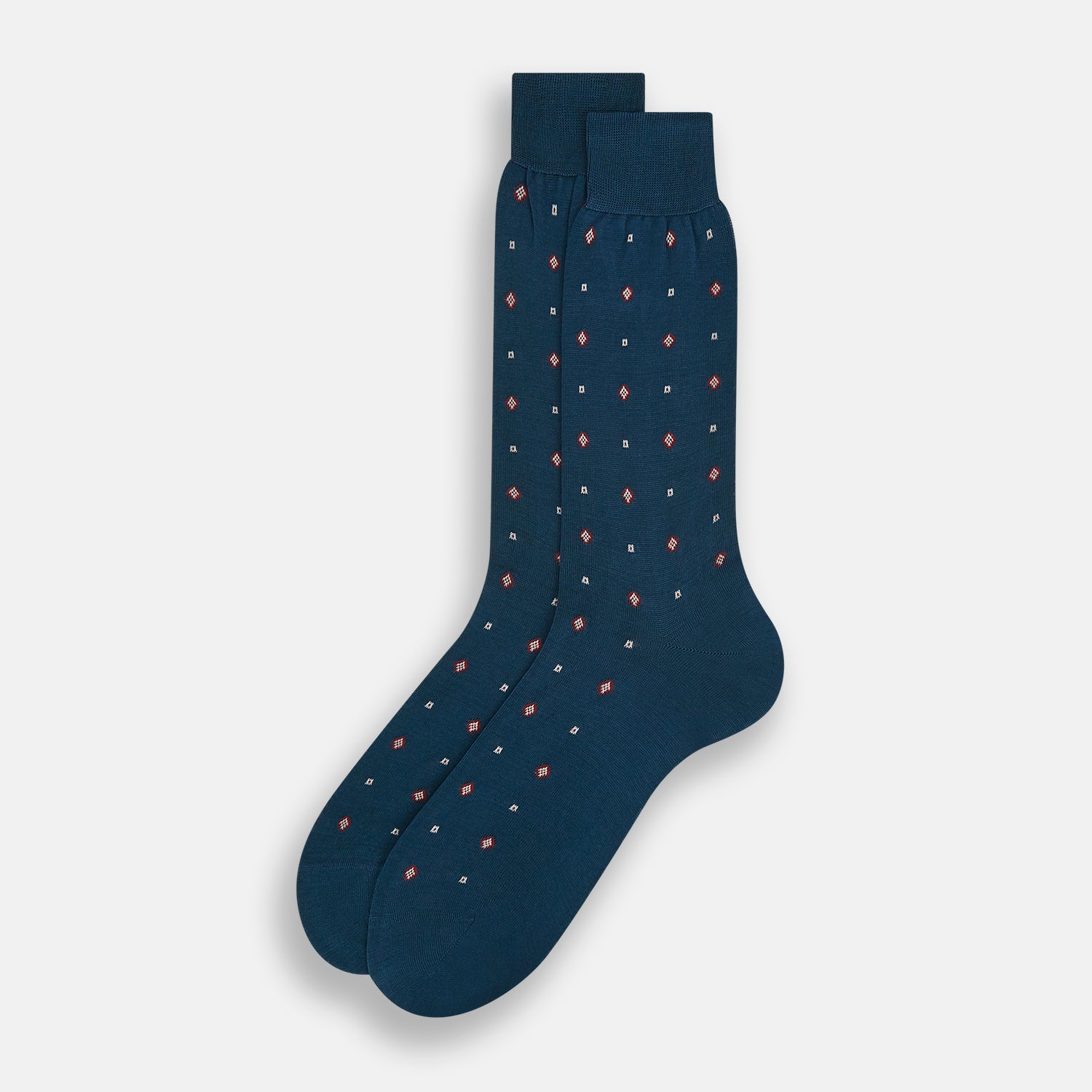 Image 2 of product The Turnbull & Asser Azzurro Patterned Mid-Length Sock is navy blue with a ribbed cuff and features a small red and white diamond motif, shown here individually against a plain white background.