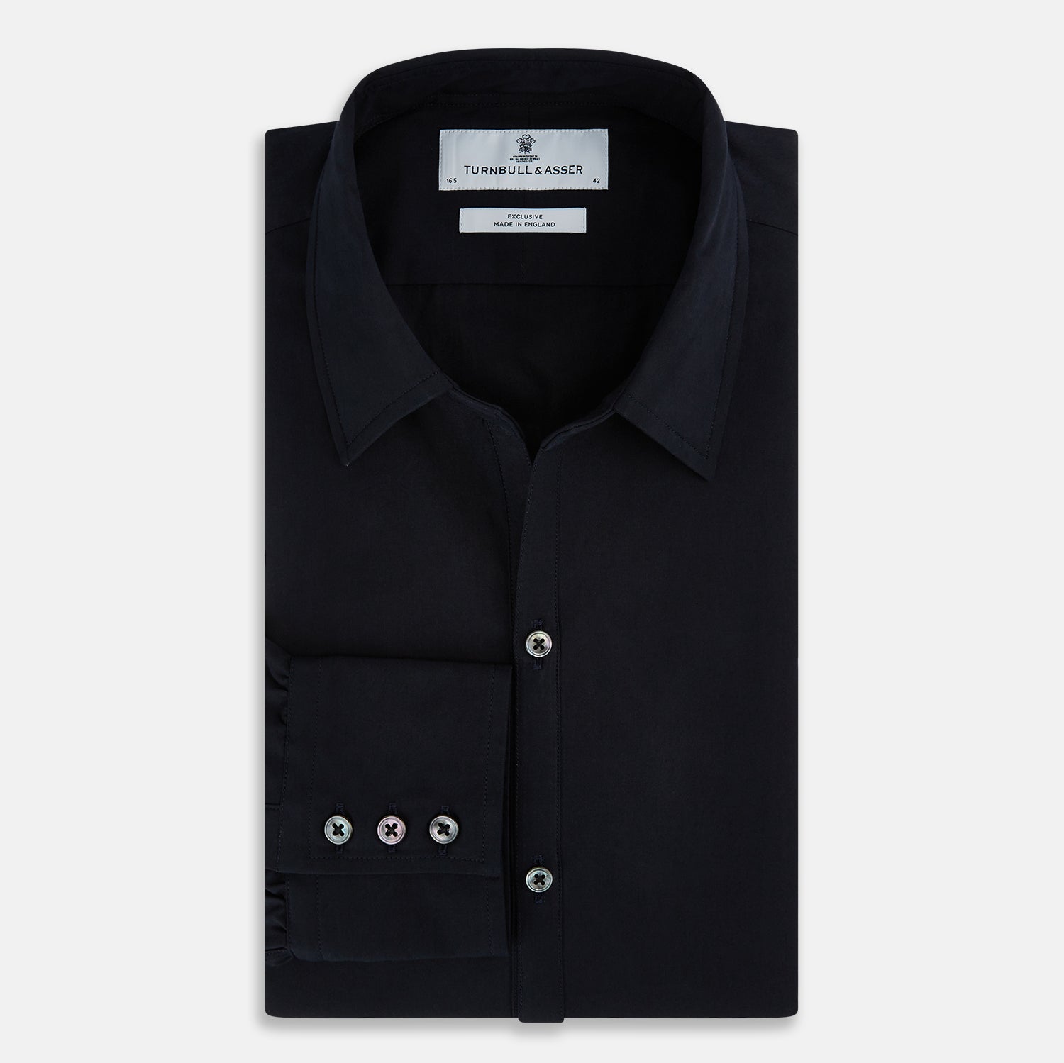 Image 5 of product The DARK NAVY WINDSOR SHIRT by Turnbull & Asser is a long-sleeve shirt with a refined Windsor collar, showcasing classic British craftsmanship.