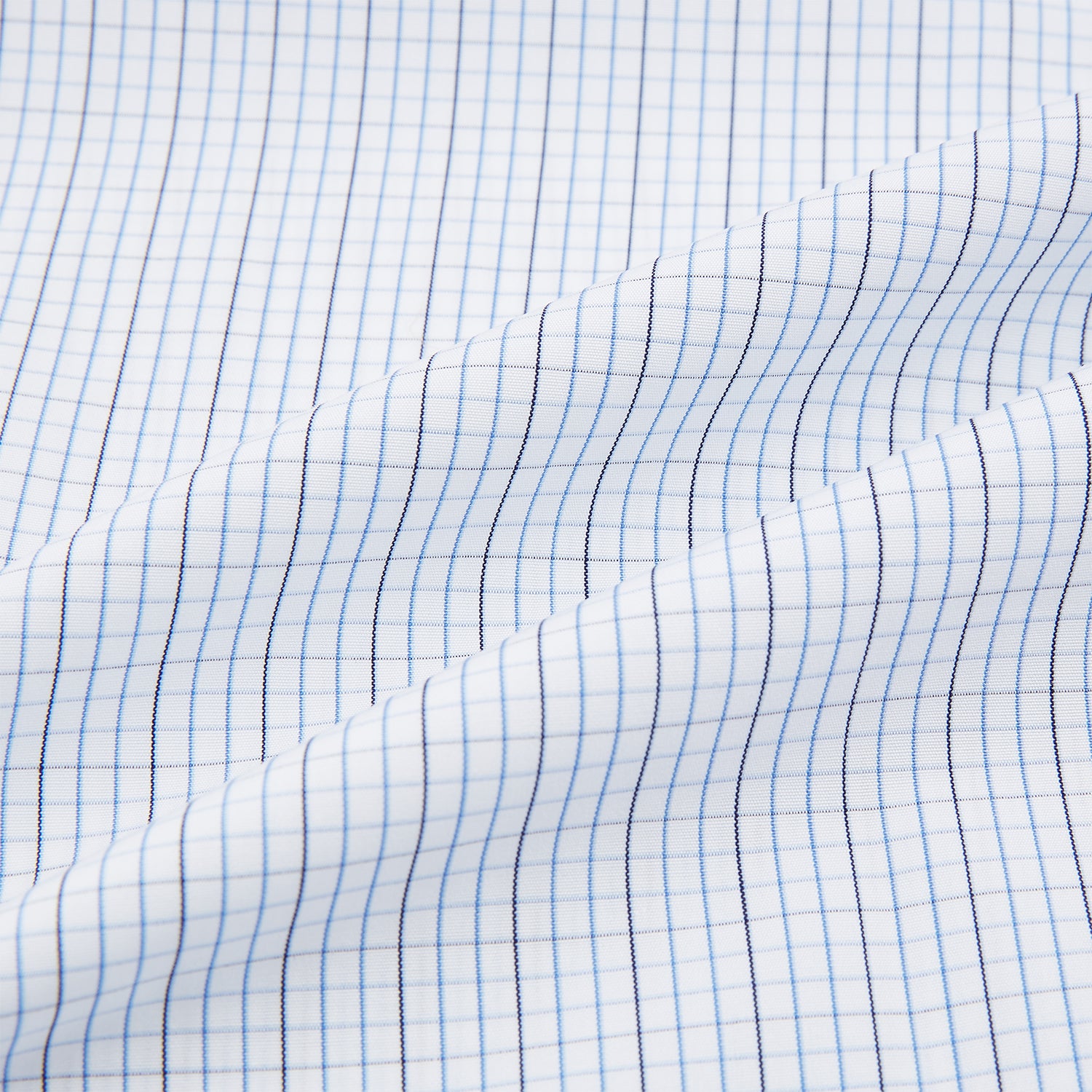 Image 6 of product The Turnbull & Asser Pale Blue and Navy Grid Check Shirt features a contrast T&A collar and cuffs, long sleeves, and a button-down front, all displayed on a plain white background.