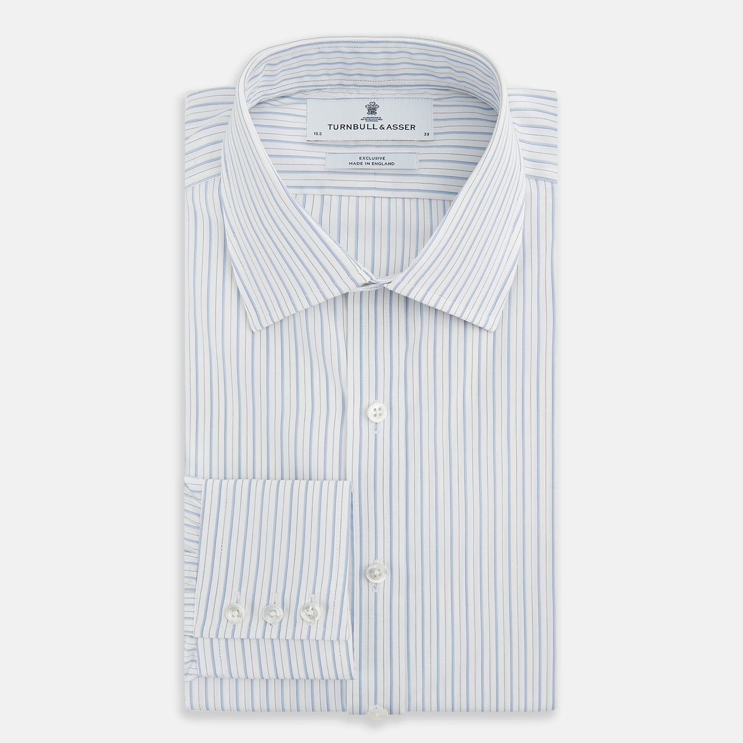 Image 5 of product The Turnbull & Asser Sky Blue Combination Stripe Mayfair Shirt features long sleeves, a T&A collar, buttoned cuffs, and thin vertical stripes in blue, shown on a plain white background.