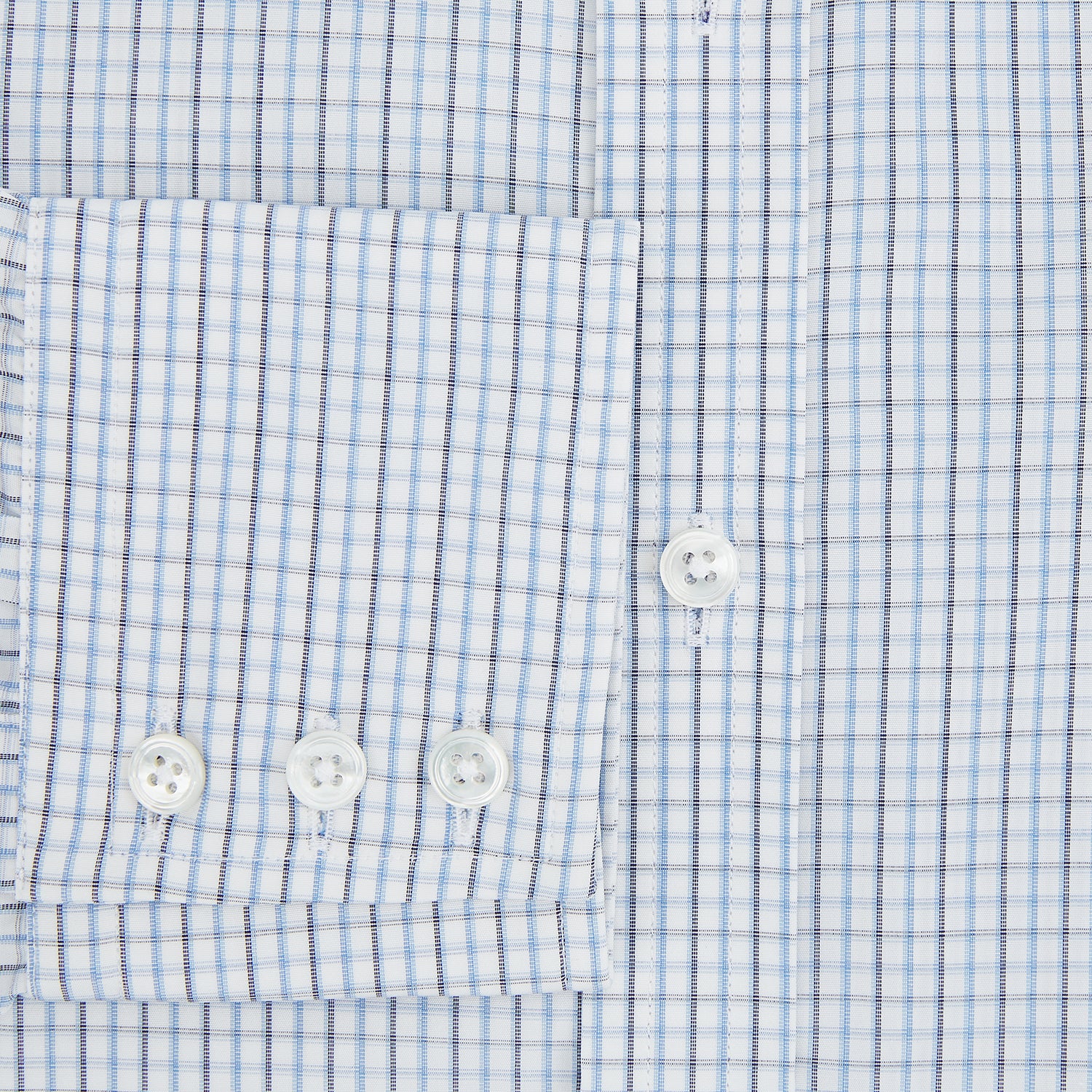 Image 4 of product The Turnbull & Asser Navy and Blue Multi Check Mayfair Shirt features a T&A collar, button cuffs, and a blue checkered pattern. This long-sleeve, button-up shirt is shown on a white background.