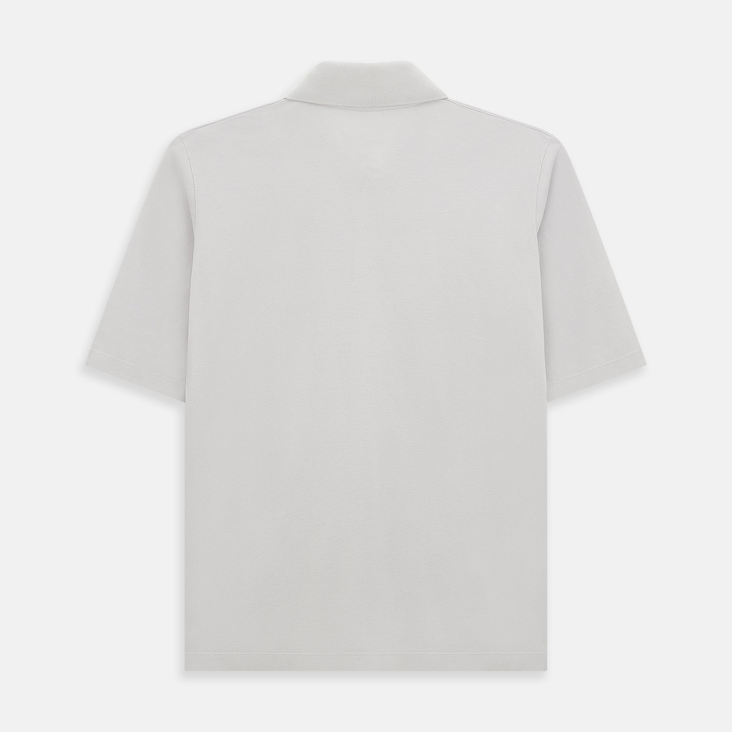 Image 3 of product The Turnbull & Asser Pale Pink Polo Shirt is a cotton jersey short-sleeve polo with a collar, three brown buttons on the placket, and a button-flap chest pocket, shown against a white background.