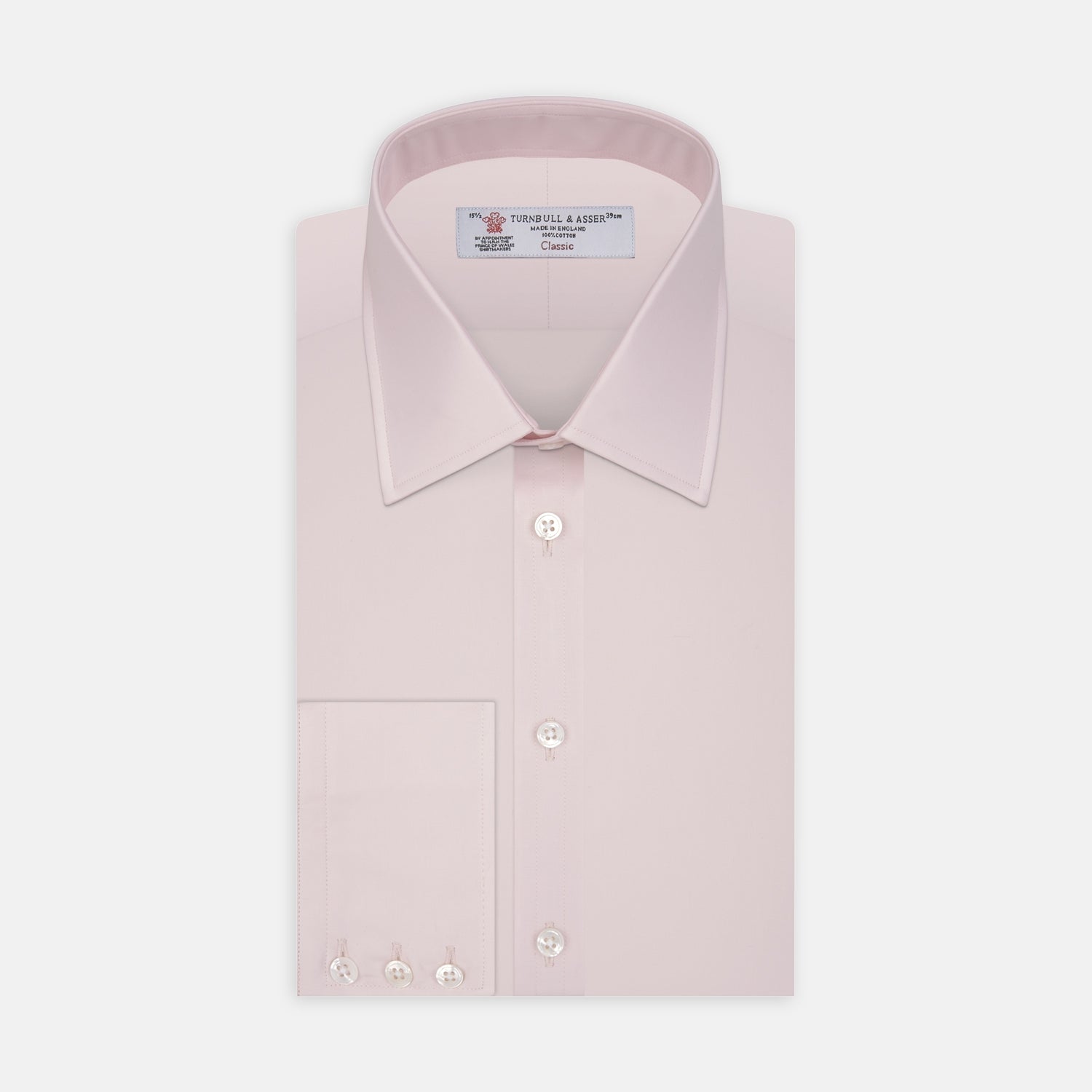 Image 1 of product The Turnbull & Asser Pink Cotton Shirt features a T&A collar, 3-button cuffs, and a clean-cut design, displayed neatly folded against a plain white background.